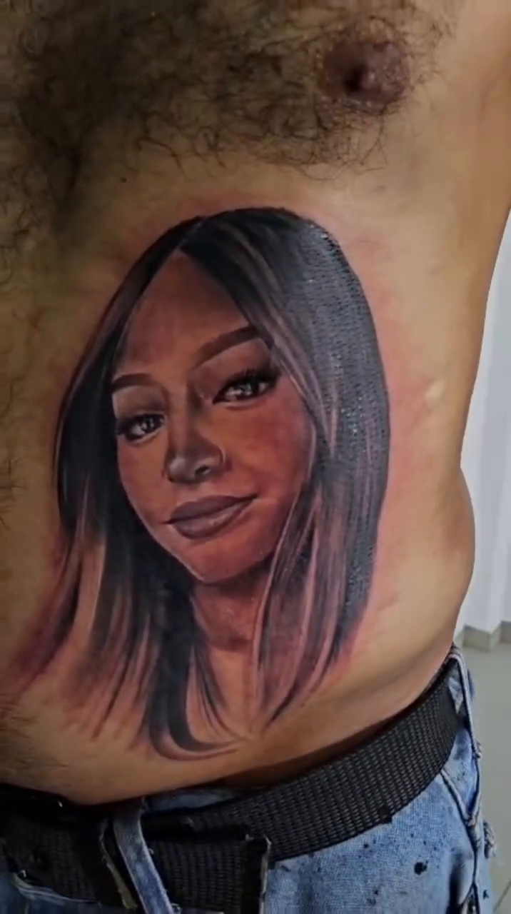 Portrait of a woman realism tattoo by Aguascali Firme