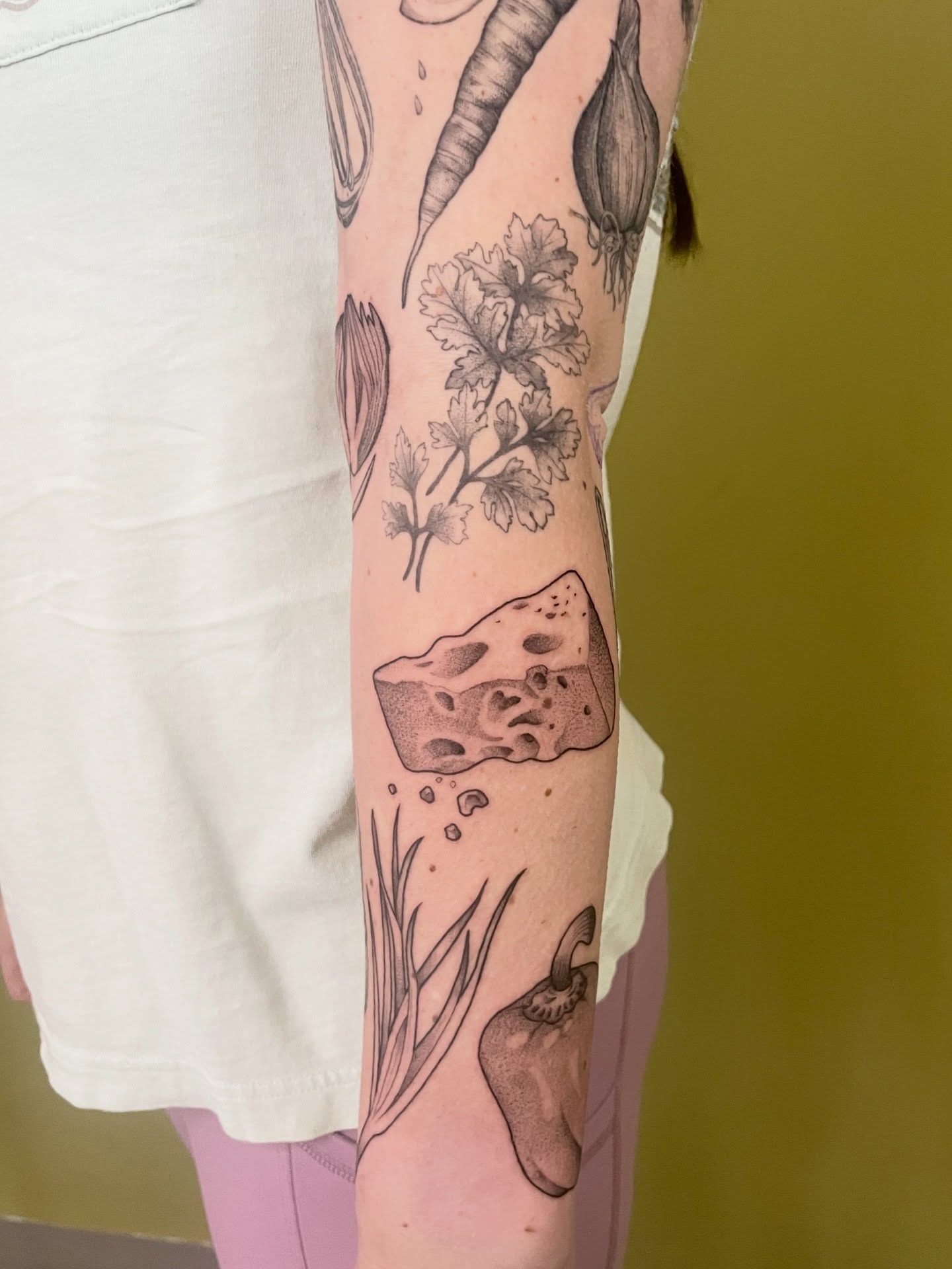 Vegetables and cheese dotwork tattoo on the forearm by ✨Erin Haines✨