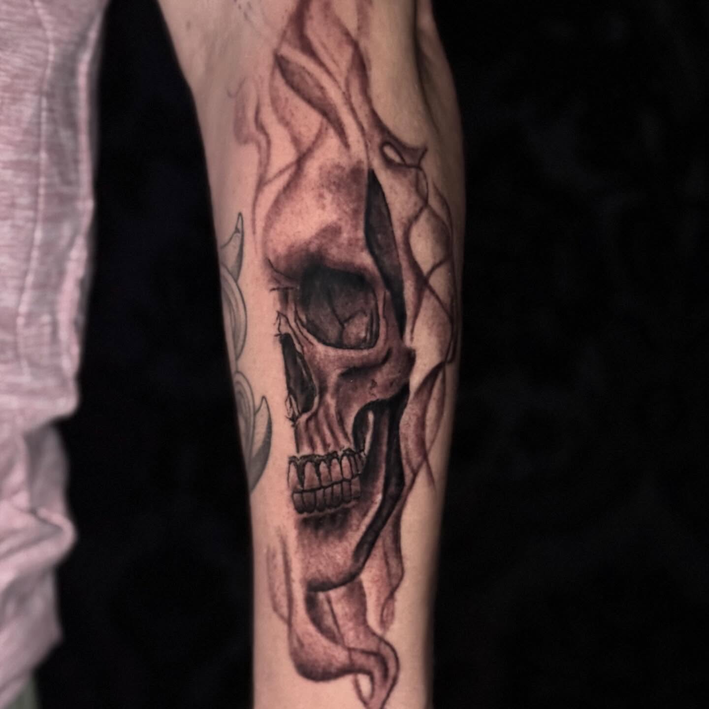 Smoking skull realism tattoo on the forearm by Jacob Bettker, Centerville, Ohio