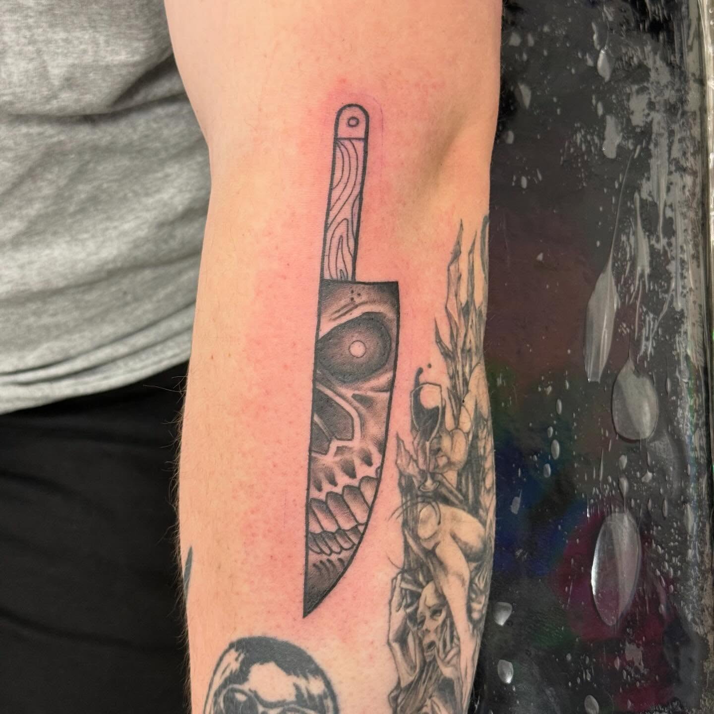 Knife black and grey tattoo on the forearm by Katrina Aldaco 🧿 Tattoo Artist