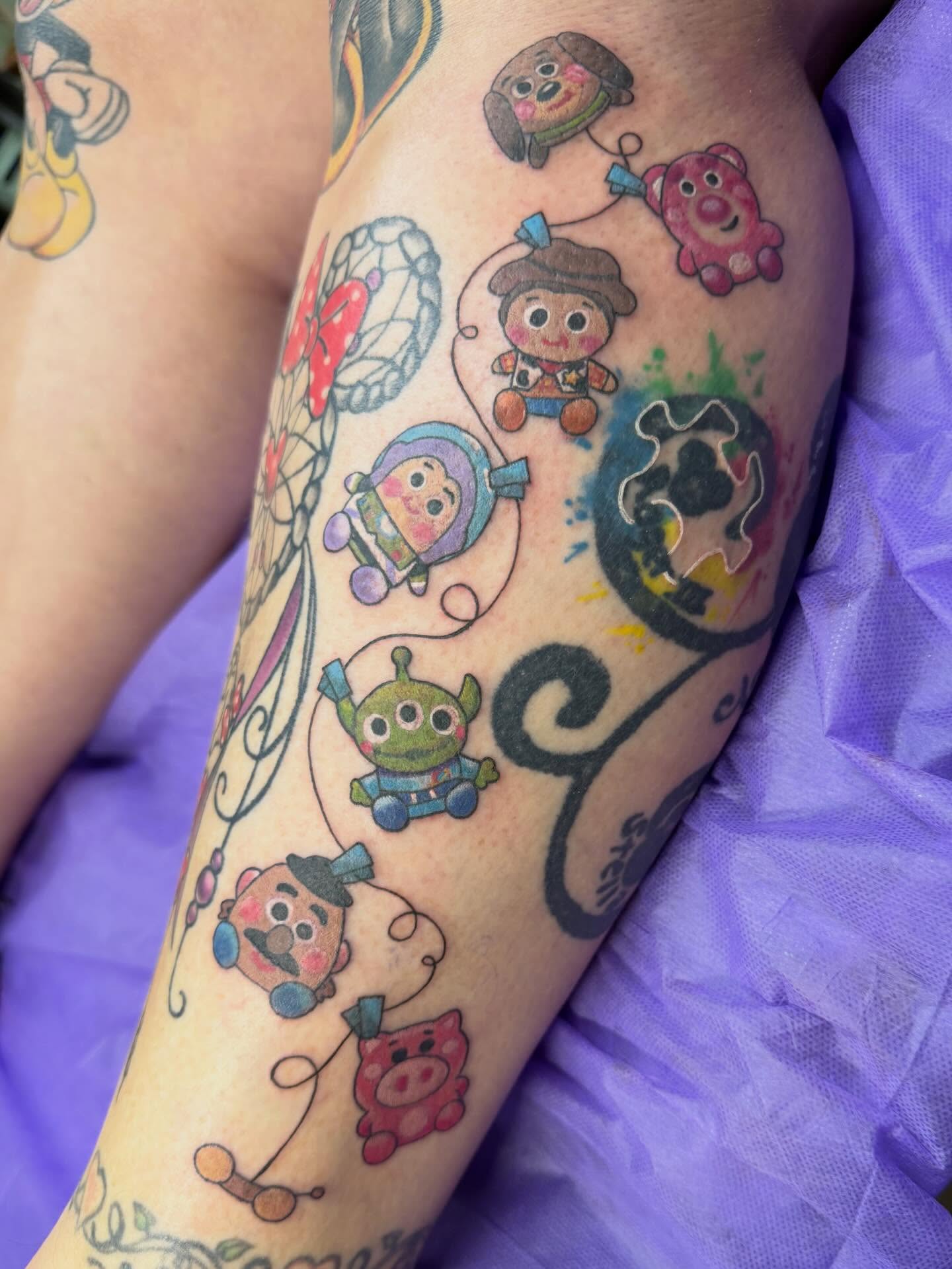 Toy characters new school tattoo on the forearm by Tina Gregg, North Ridgeville, Ohio