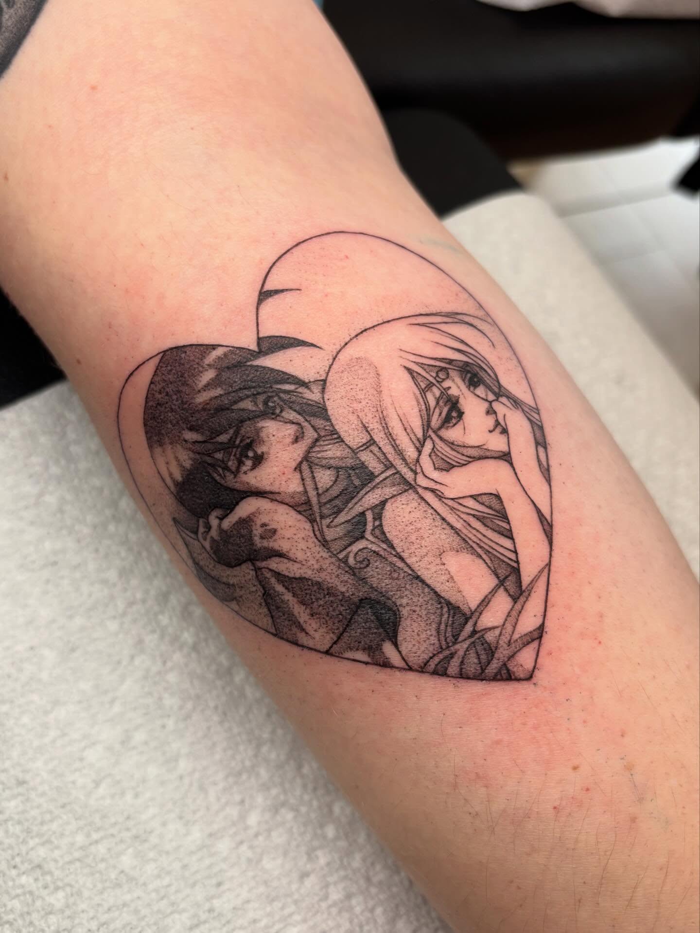 Anime characters dotwork tattoo on the forearm by joely