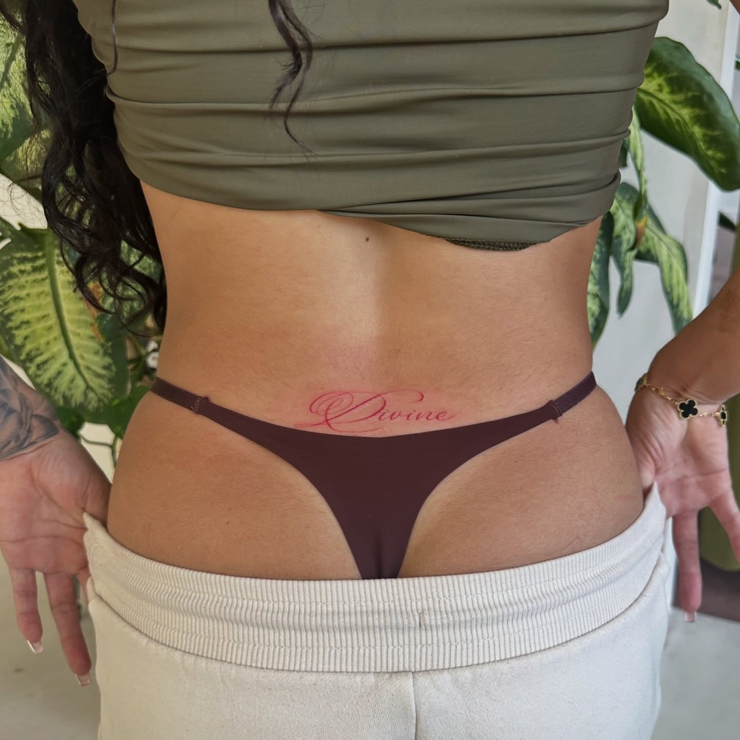 Script lettering lettering script tattoo on the torso by Ric Castellon Tattoo Artist, Los Angeles, California