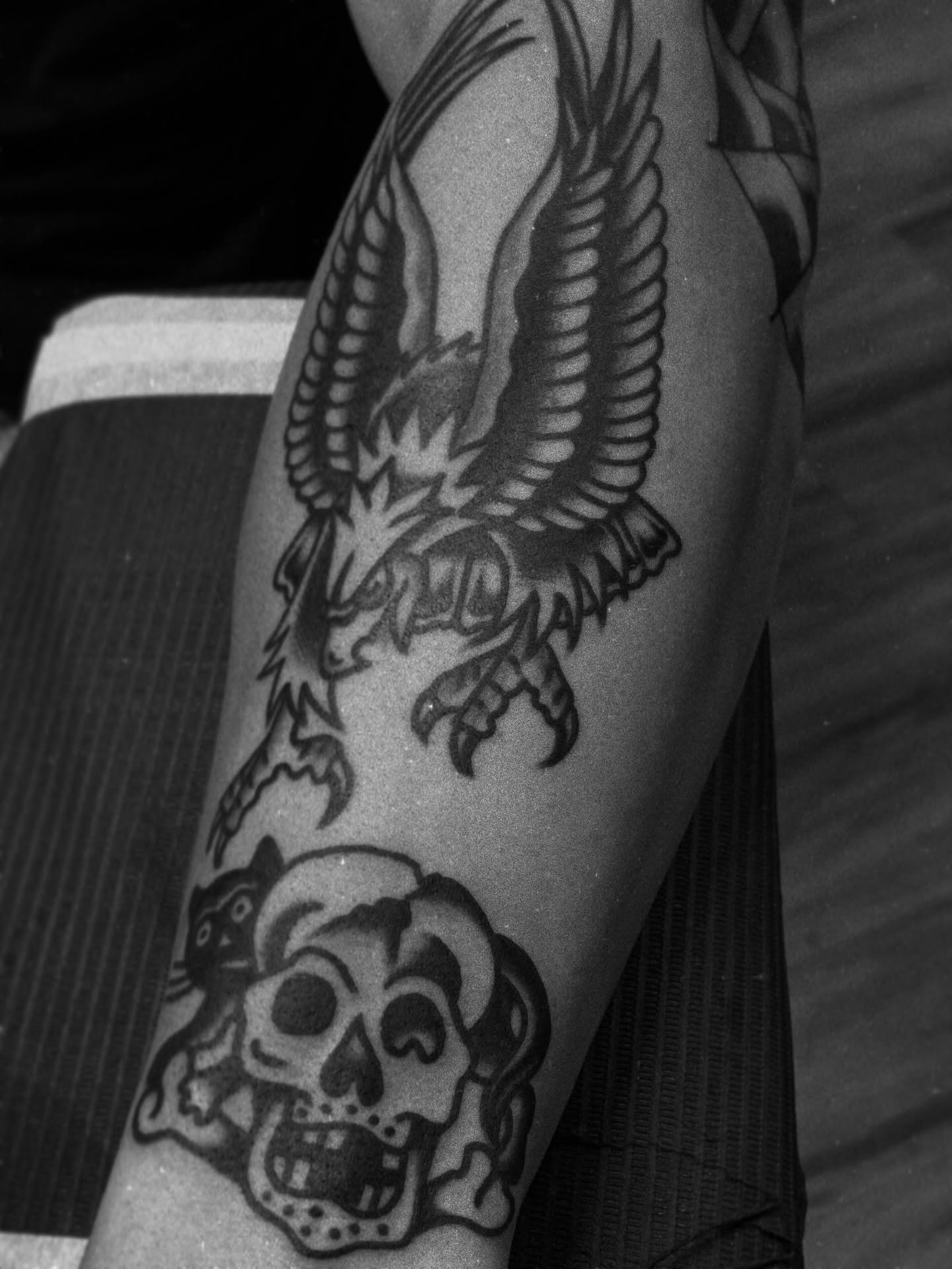 Eagle and skull American traditional tattoo on the forearm by Carlos Gonzalez Tattoo, Dallas, Texas