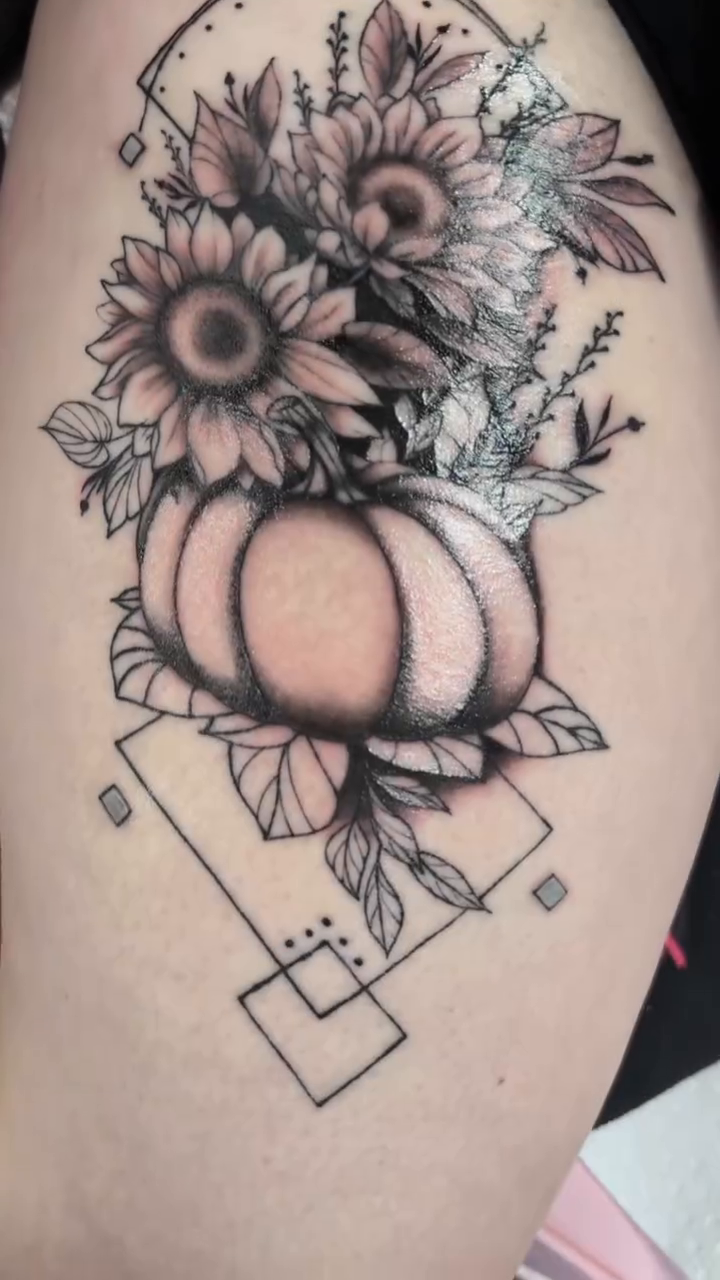 Pumpkin and sunflowers with geometric accents fine line tattoo on the thigh by Rhiannon