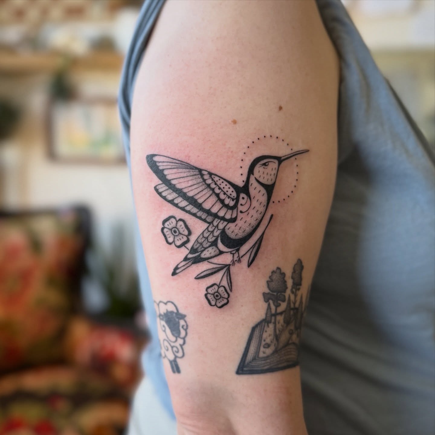 Hummingbird dotwork tattoo on the forearm by Leah - Tattoo Artist