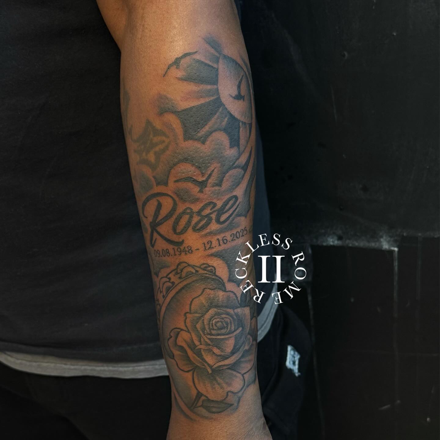 Rose black and grey tattoo on the forearm by Rome