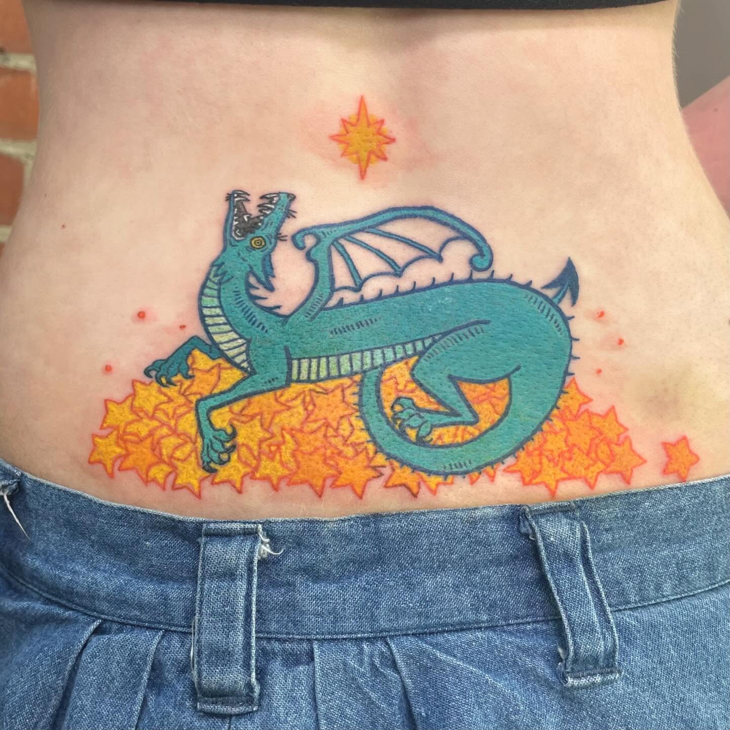Dragon illustrative tattoo on the torso by Avalon Sable