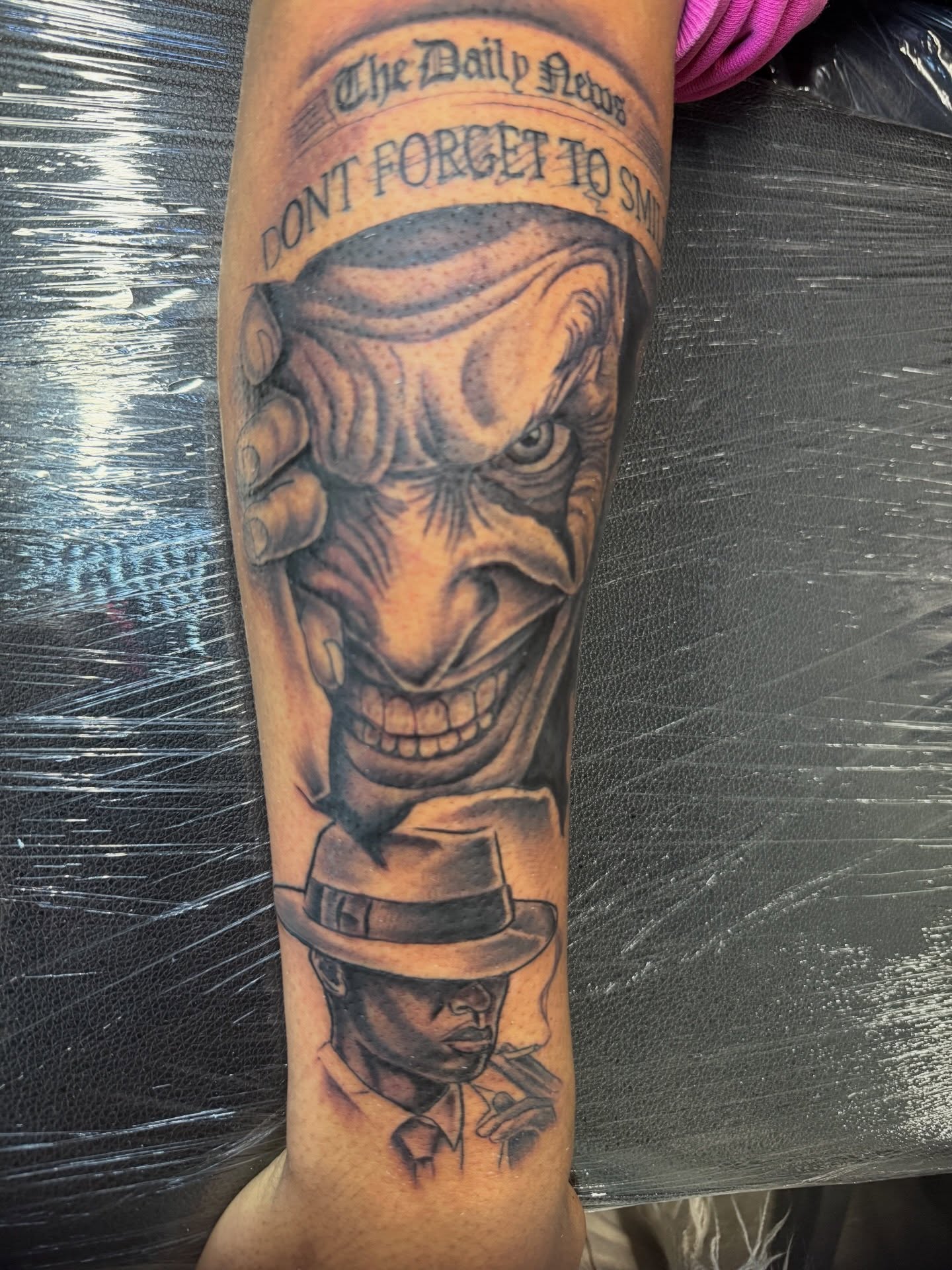 Clown head realism tattoo on the forearm by Butta