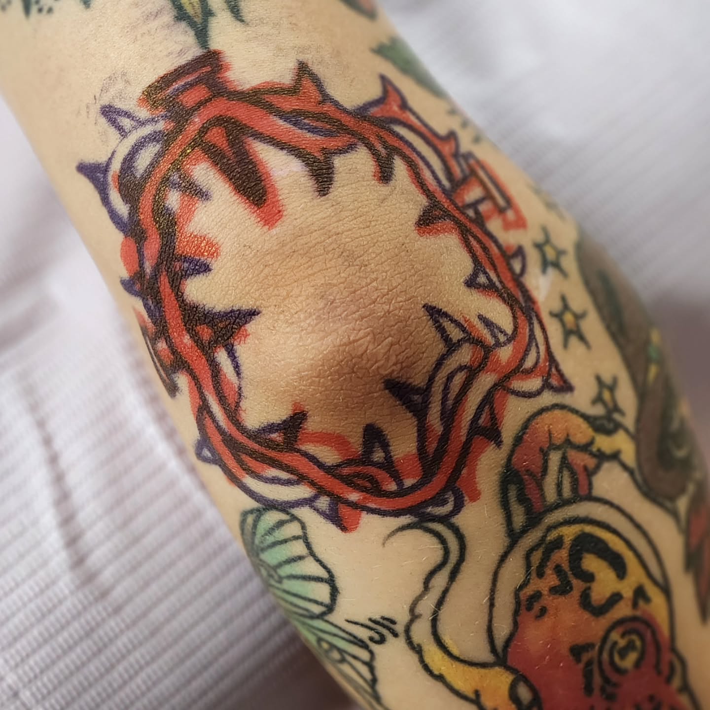 Crown of thorns American traditional tattoo on the forearm by Sonya ๐ฟ๐ธ๐พ