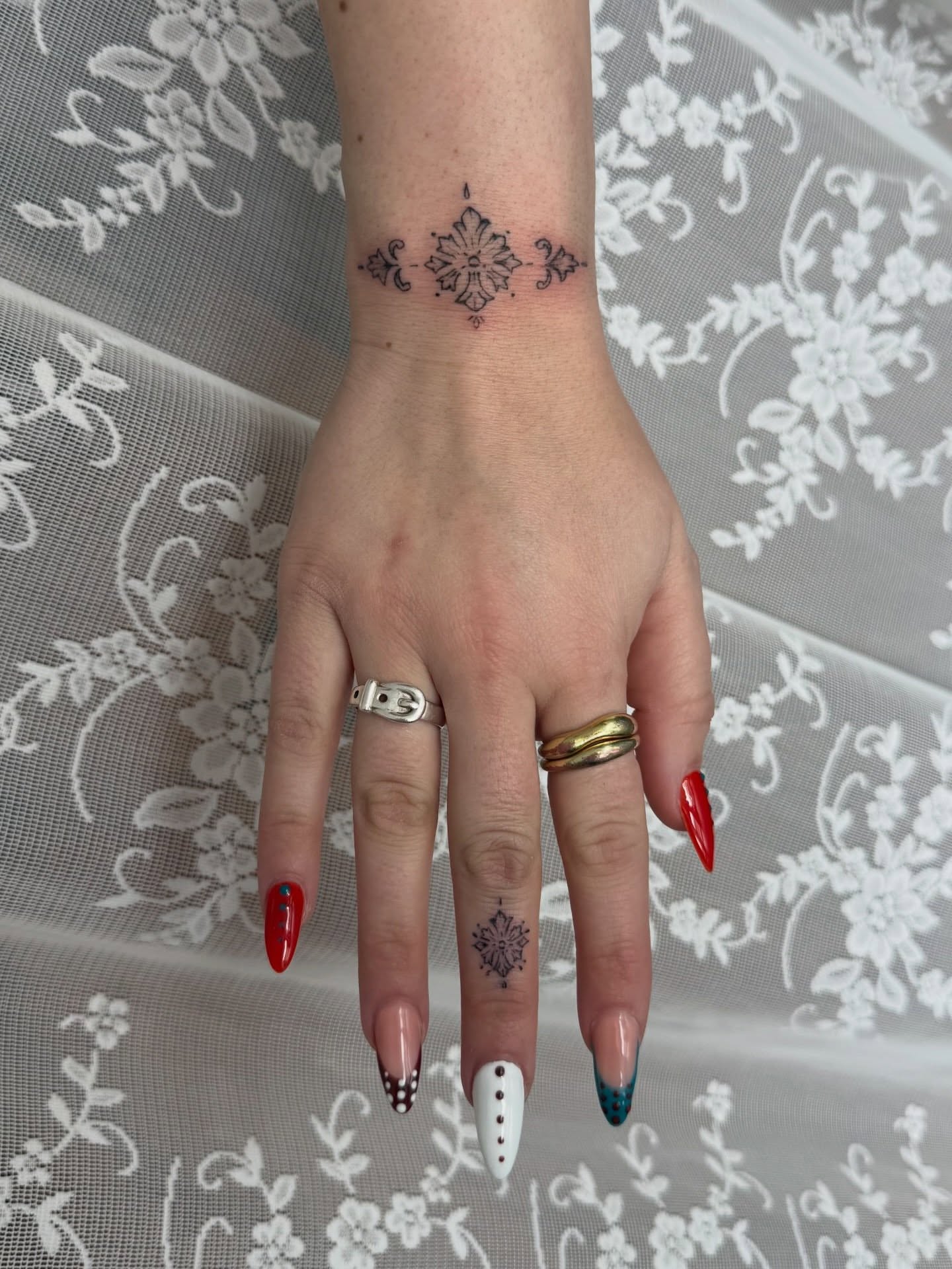 Snowflake geometric tattoo on the forearm by Lindsay Shriver