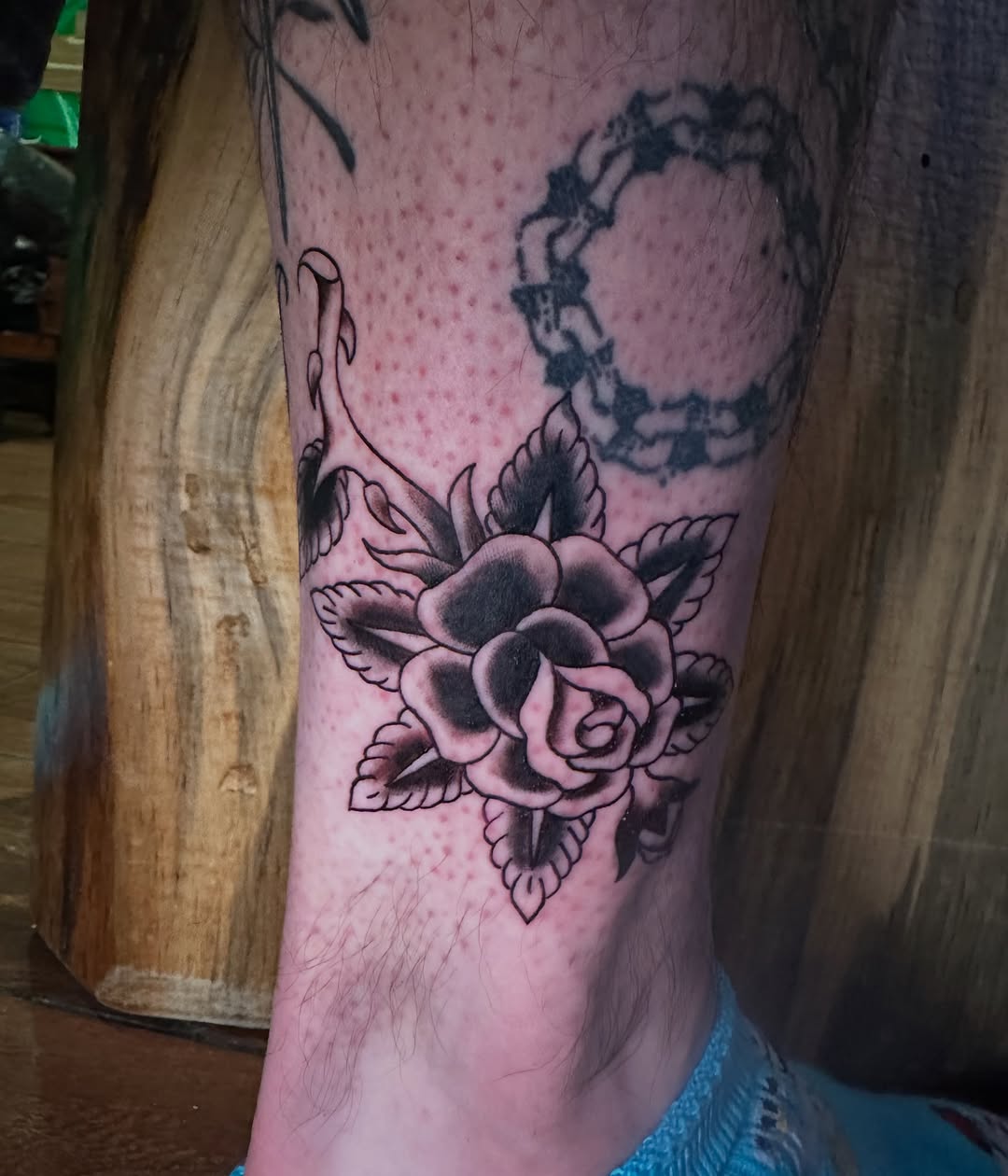 Rose neo-traditional tattoo on the forearm by Alexander Haber