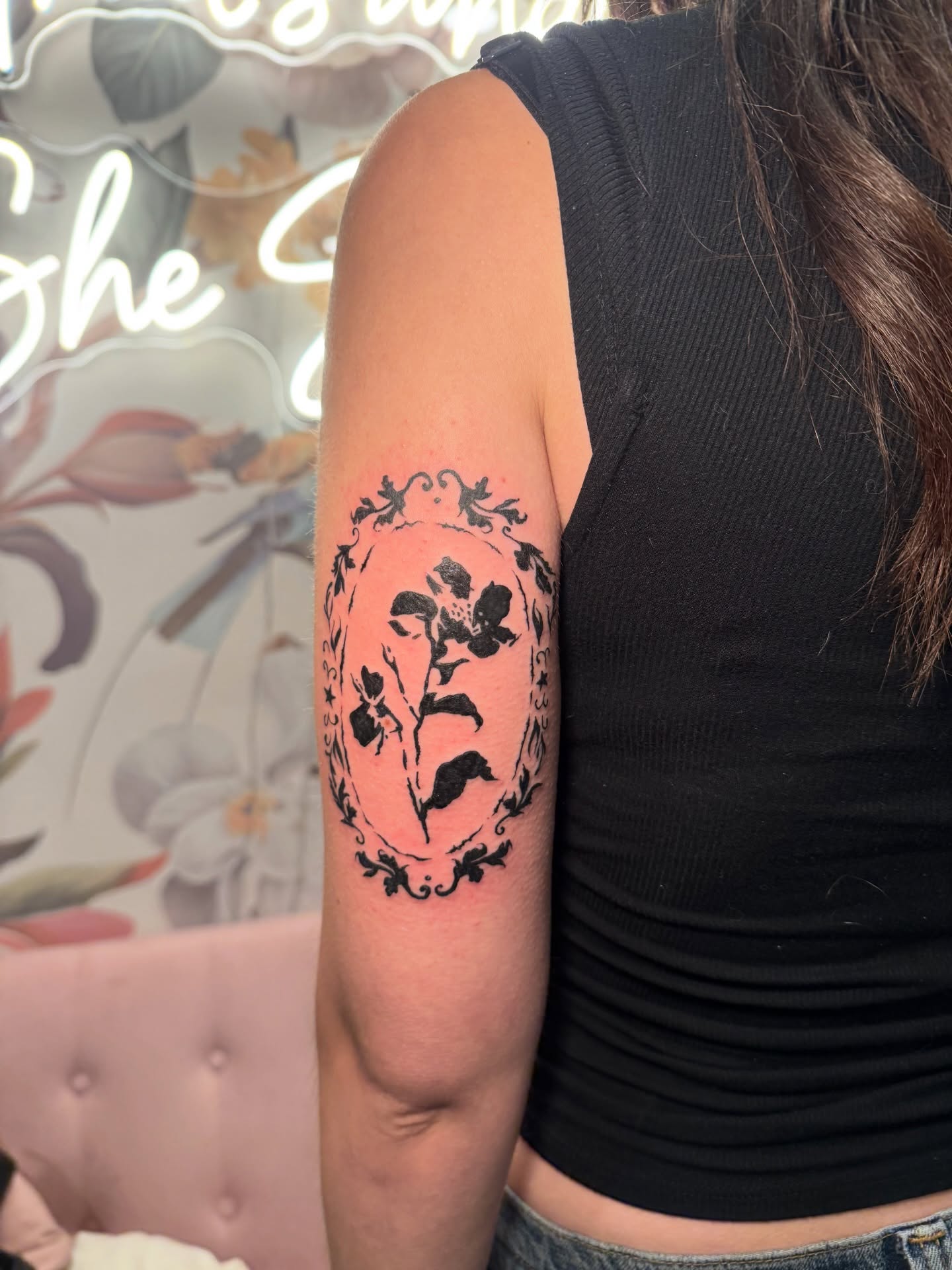 Flower black and grey tattoo on the forearm by Kinzi Brown