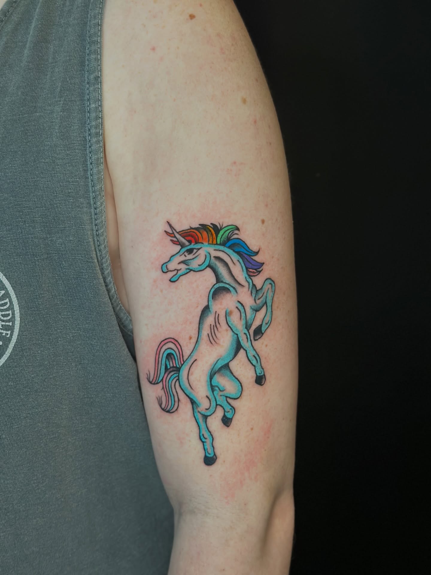 Unicorn new school tattoo on the forearm by Tyyler Santor (Tattoo Artist), Somerville, Massachusetts