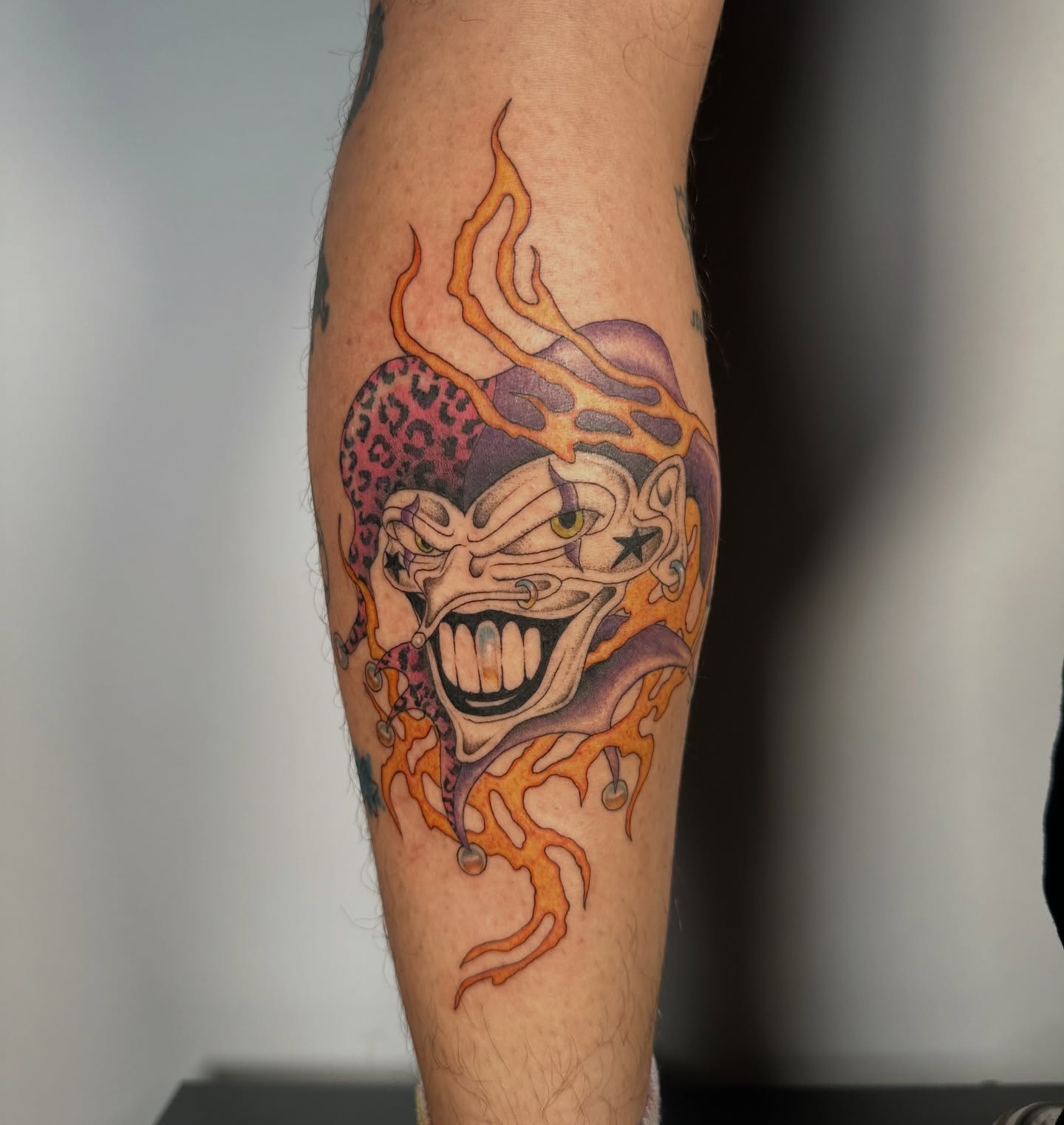 Flaming leopard head new school tattoo on the forearm by sechi