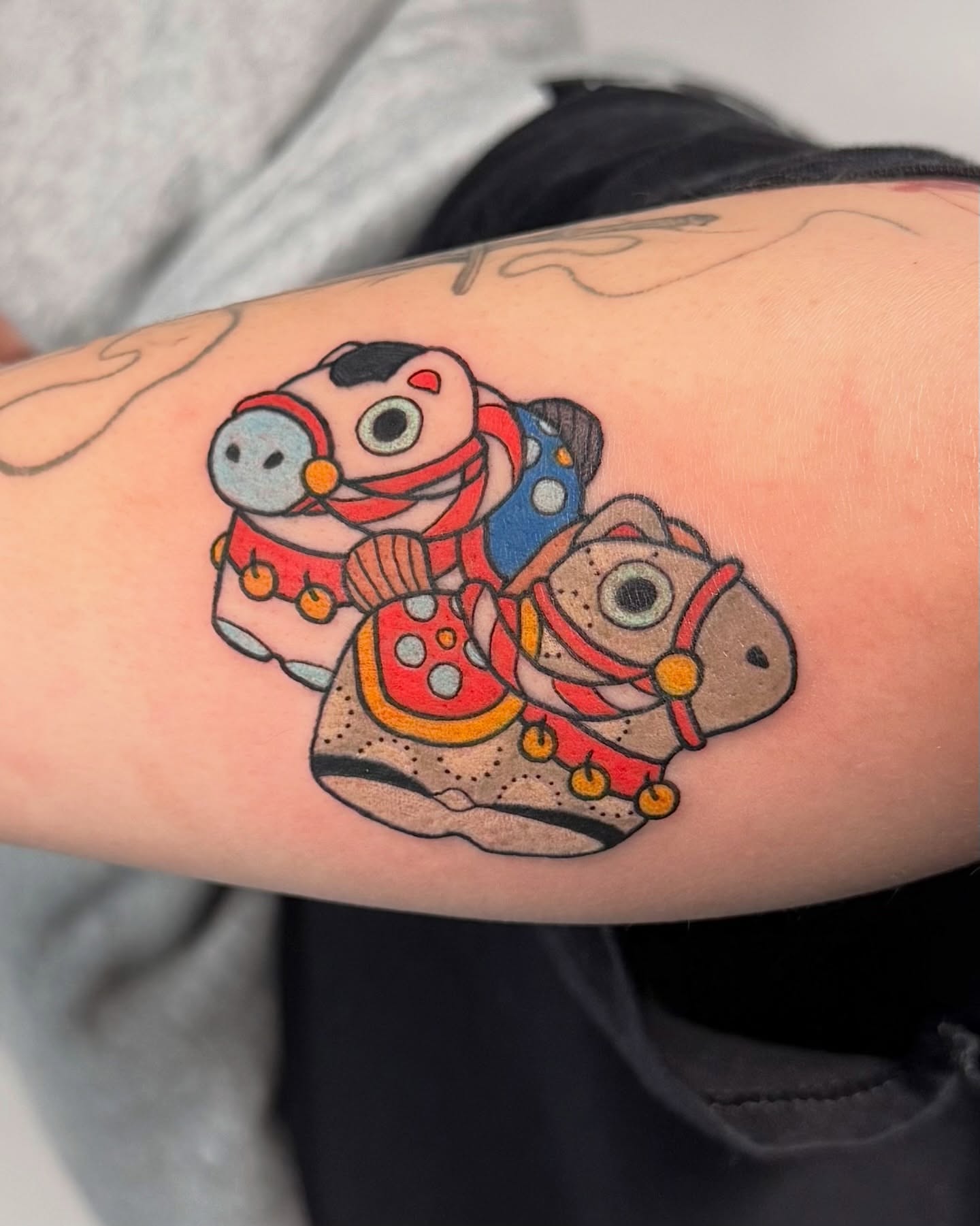 Lion dance dotwork tattoo on the forearm by binh