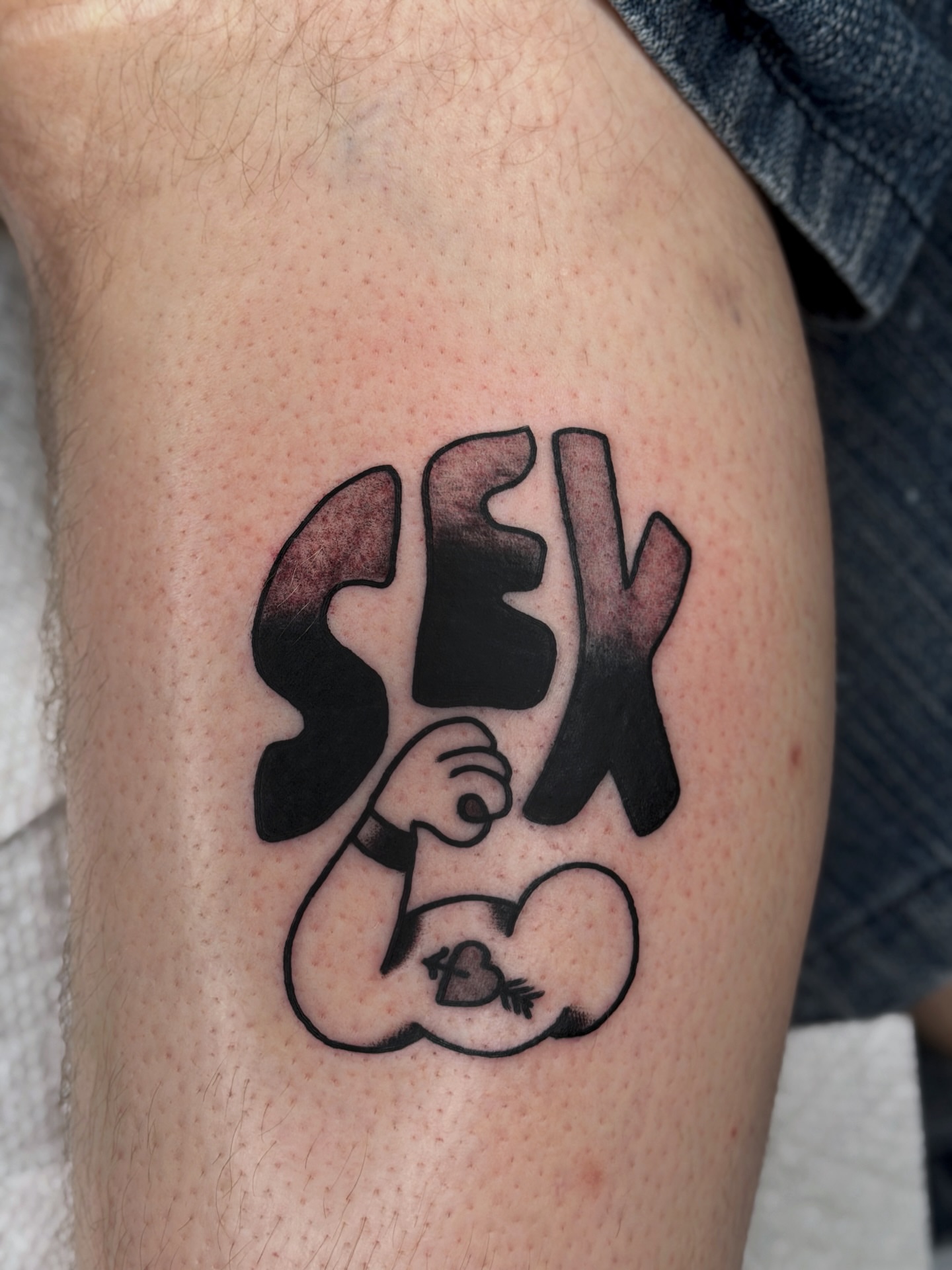 Sex black and grey tattoo on the forearm by Diego Treviño