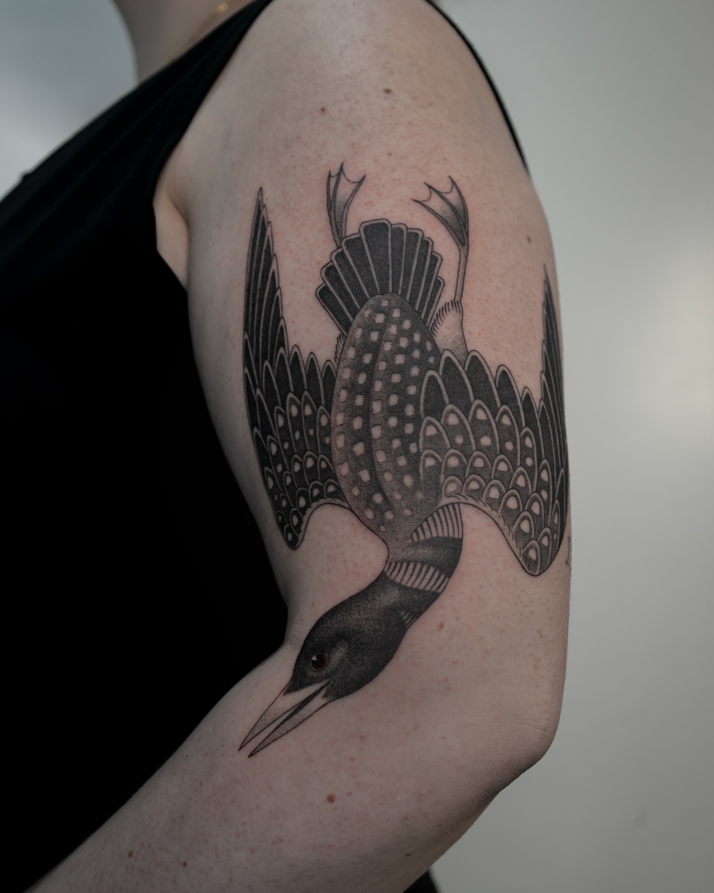 Loon dotwork tattoo on the shoulder by zak brochu, Windsor, Ontario