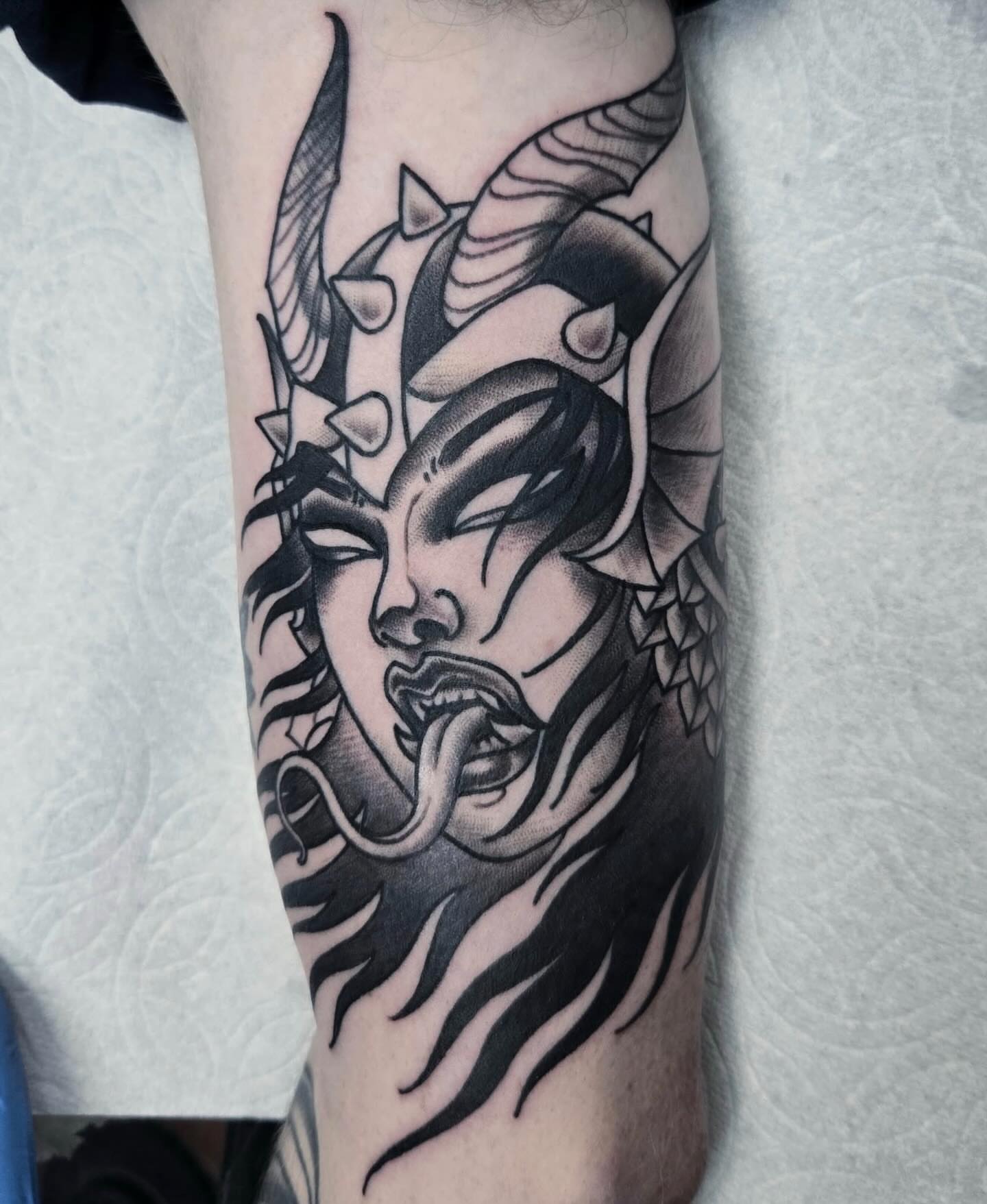 Demon woman dark realism tattoo on the forearm by ๐