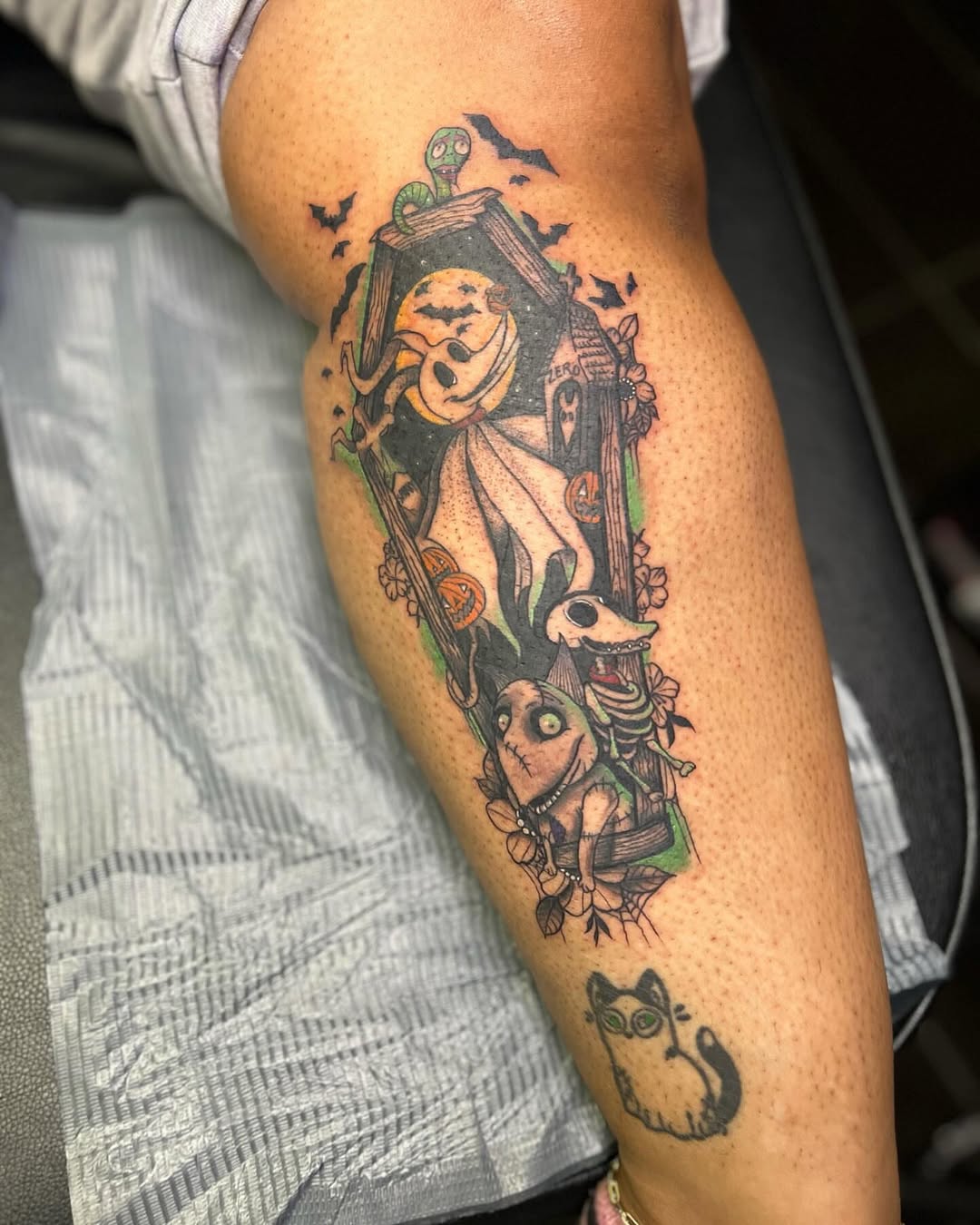 Nightmare Before Christmas coffin scene realism tattoo on the forearm by Jazz Walker