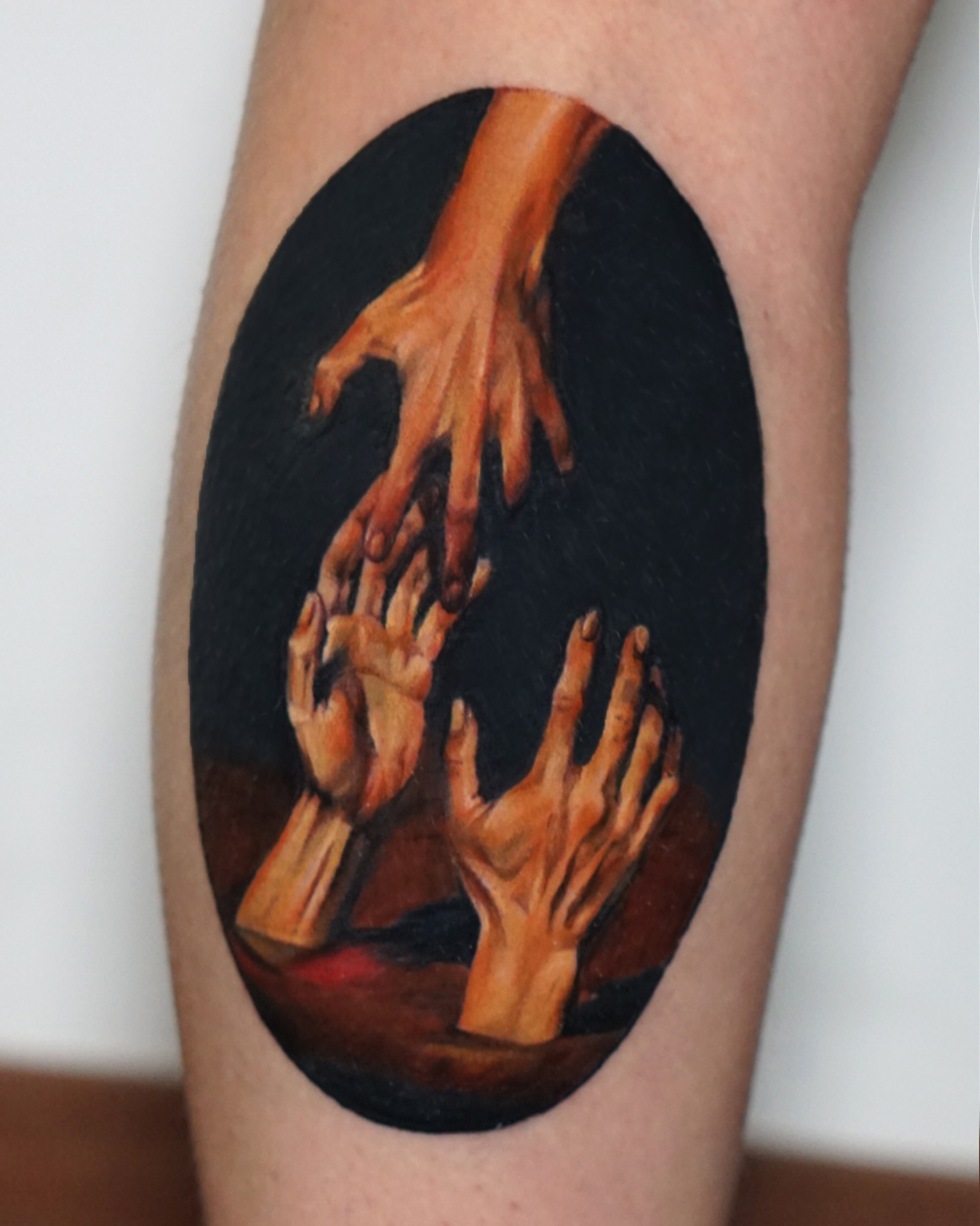 Hands reaching upward realism tattoo on the forearm by San Diego Color Realism and Neotraditional
