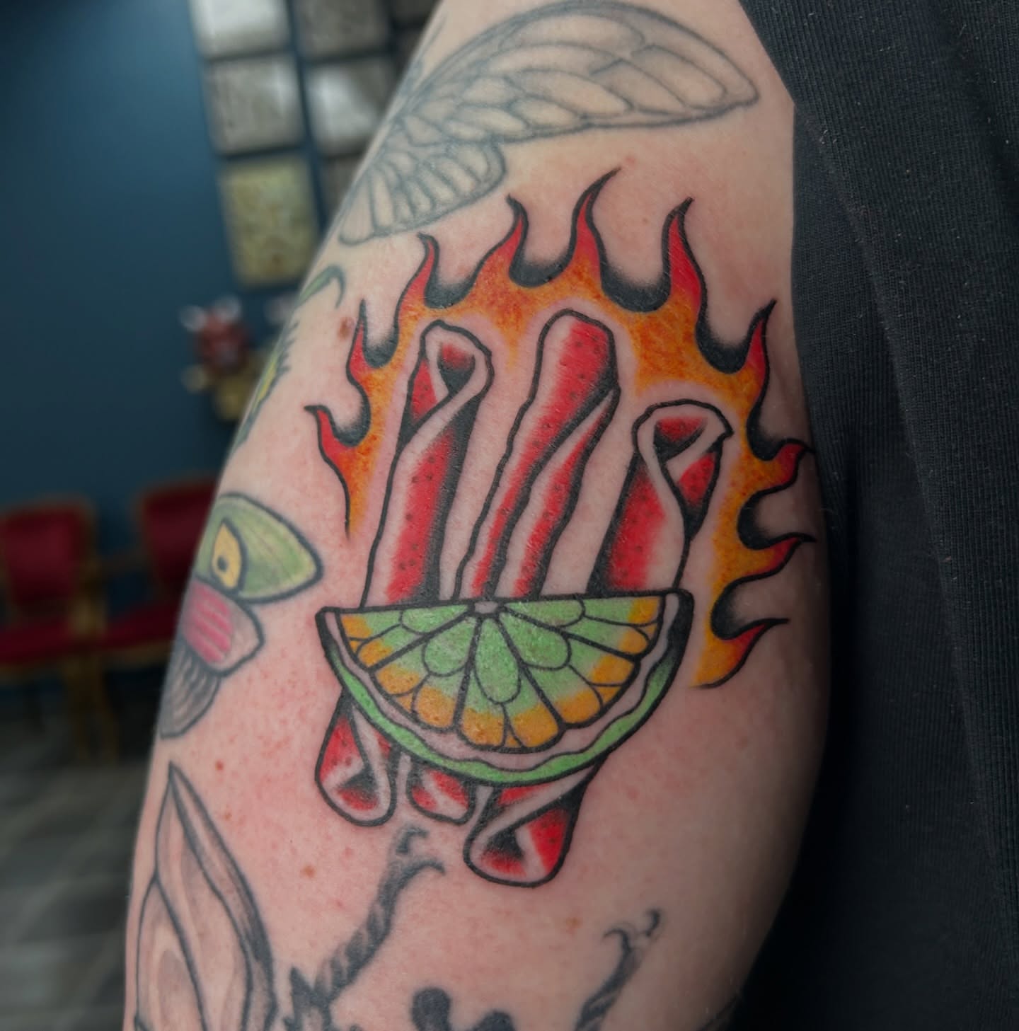 Bacon and lime American traditional tattoo on the forearm by Dylan James