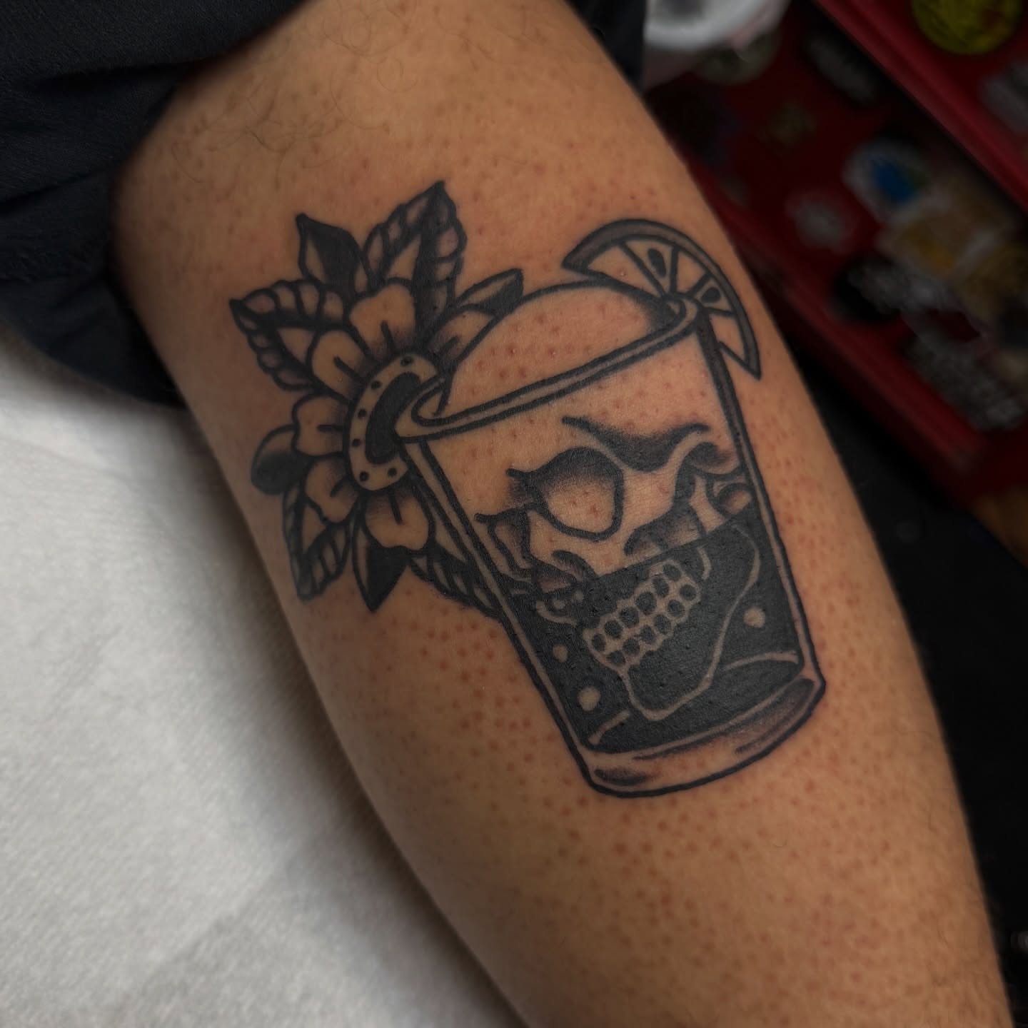 Skull and drink American traditional tattoo on the forearm by @kevingaretz, Jersey City, New Jersey