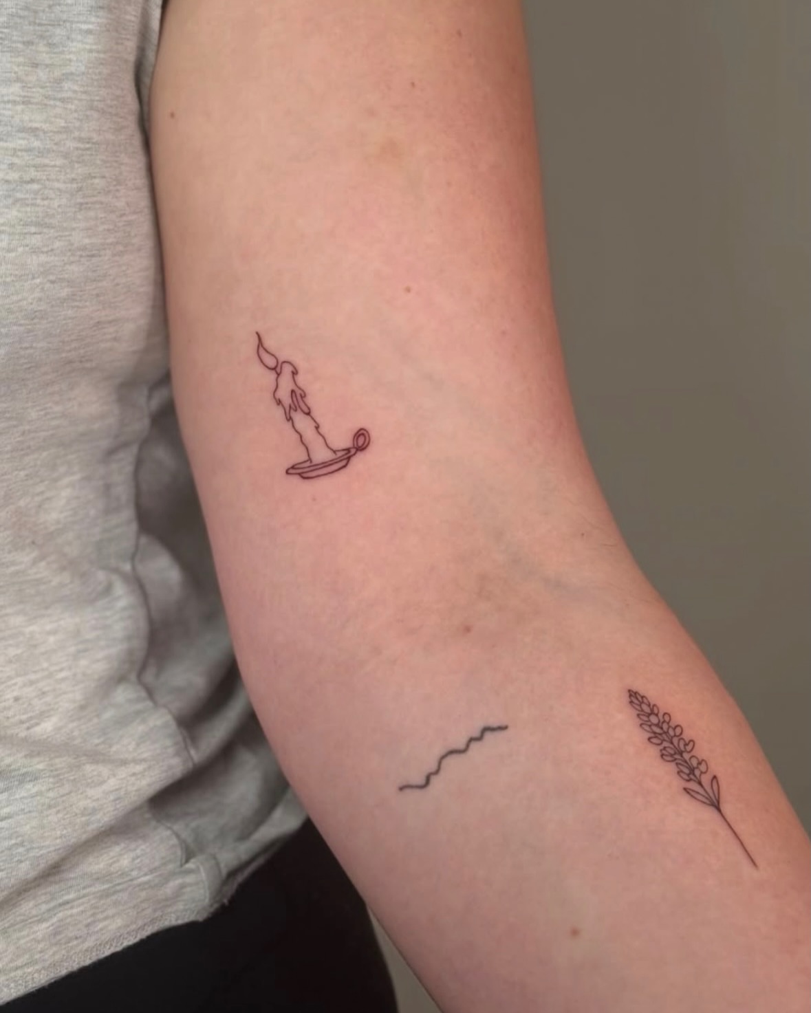 Boat with flame minimalist tattoo on the forearm by Jules Ink ⋆ Fineline Tattoo
