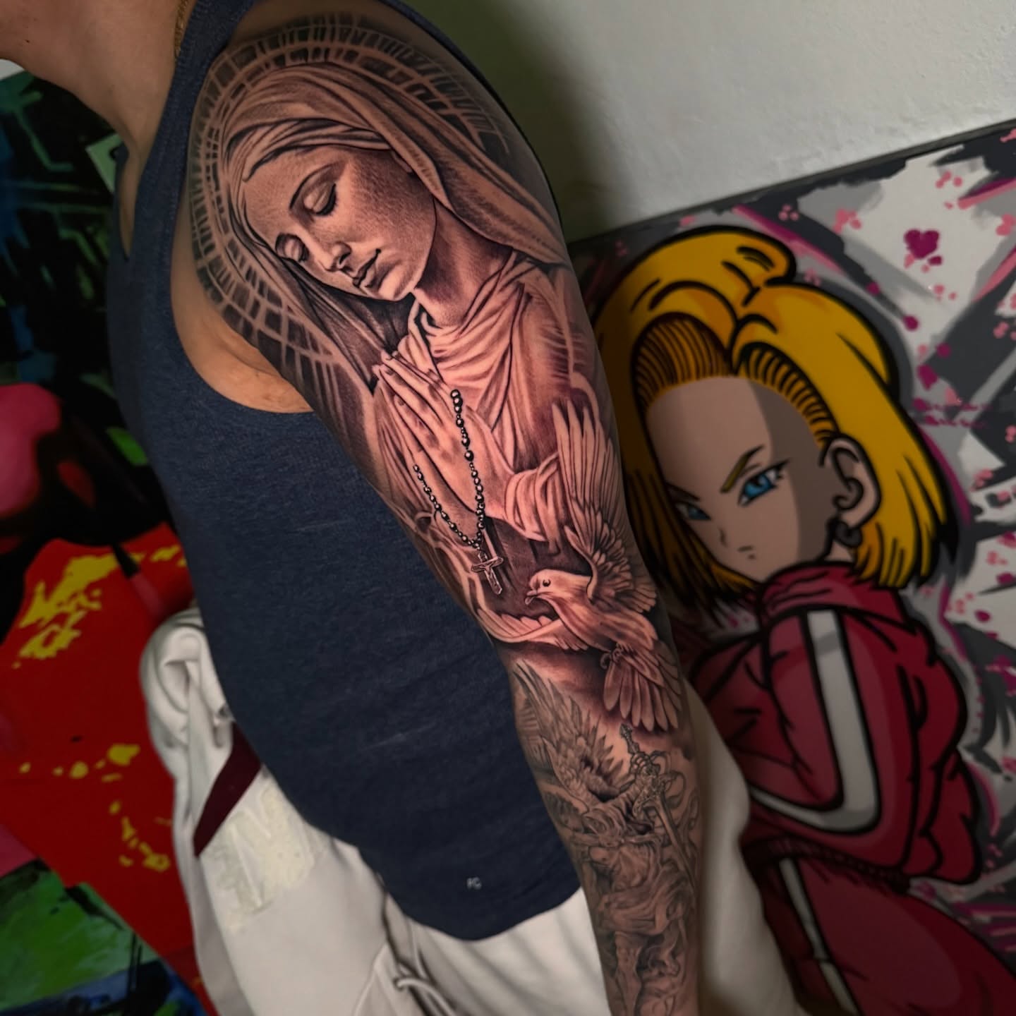 Religious figure praying realism tattoo on the forearm by TattoozbyAlexander