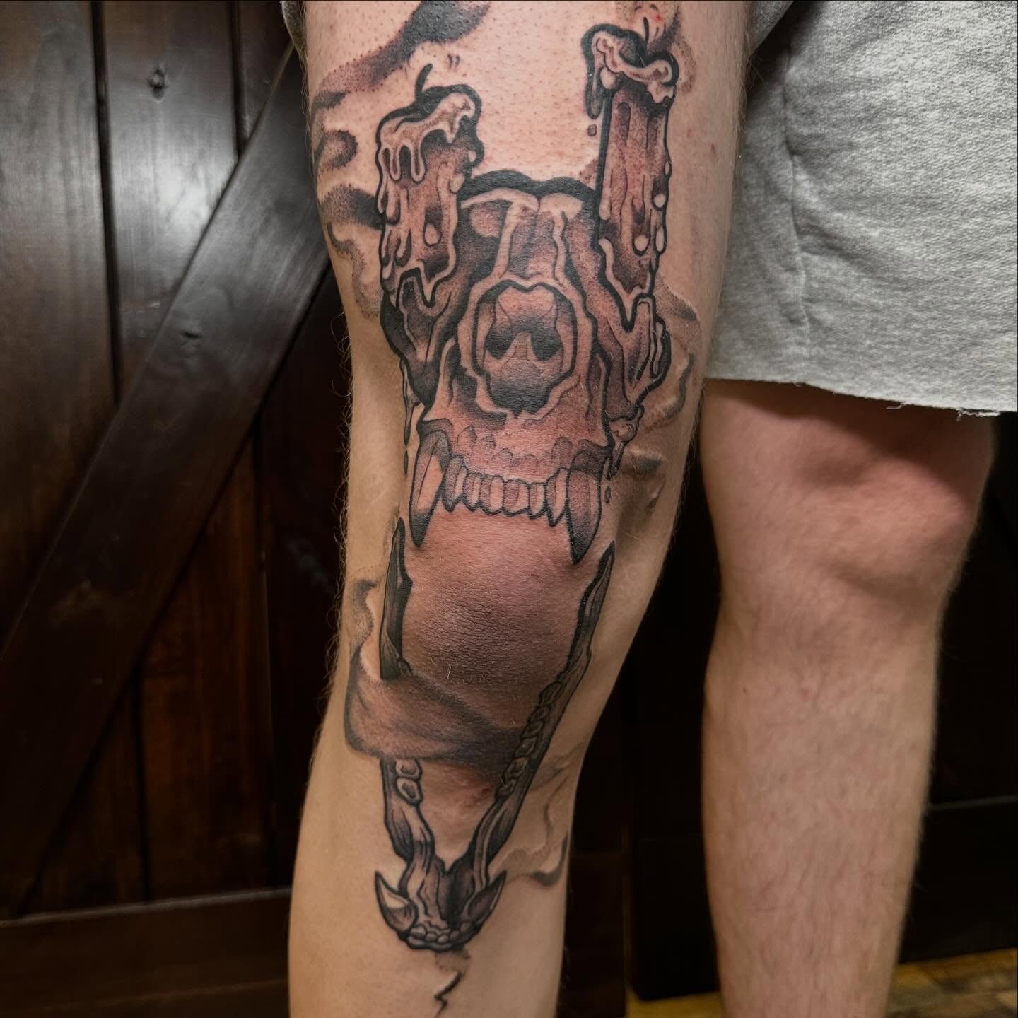 Skull and candles black and grey tattoo on the calf by Dana Smithson-Taylor ๐ณ๏ธโ๐