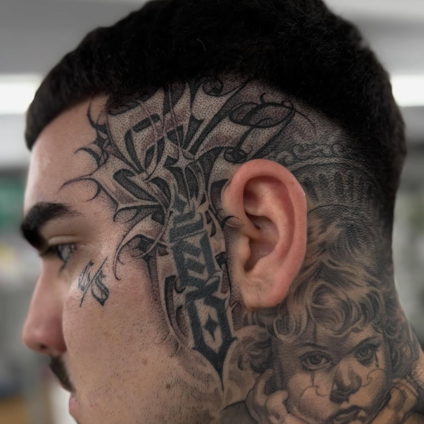 Child's face dotwork tattoo on the head by Ashley brown, Las Vegas, Nevada