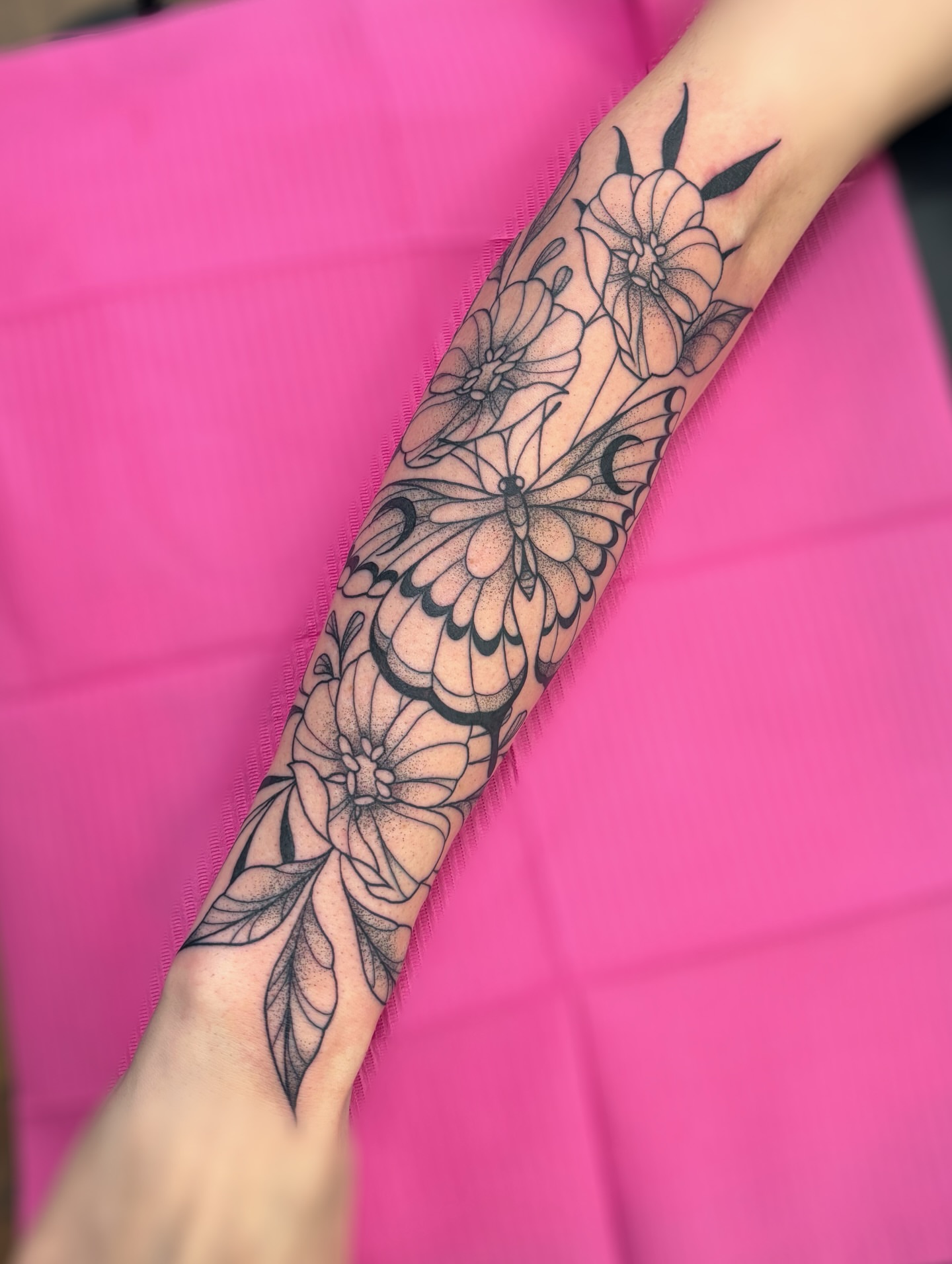 Butterfly and flowers black and grey tattoo on the forearm by ✿ sadie winter ✿