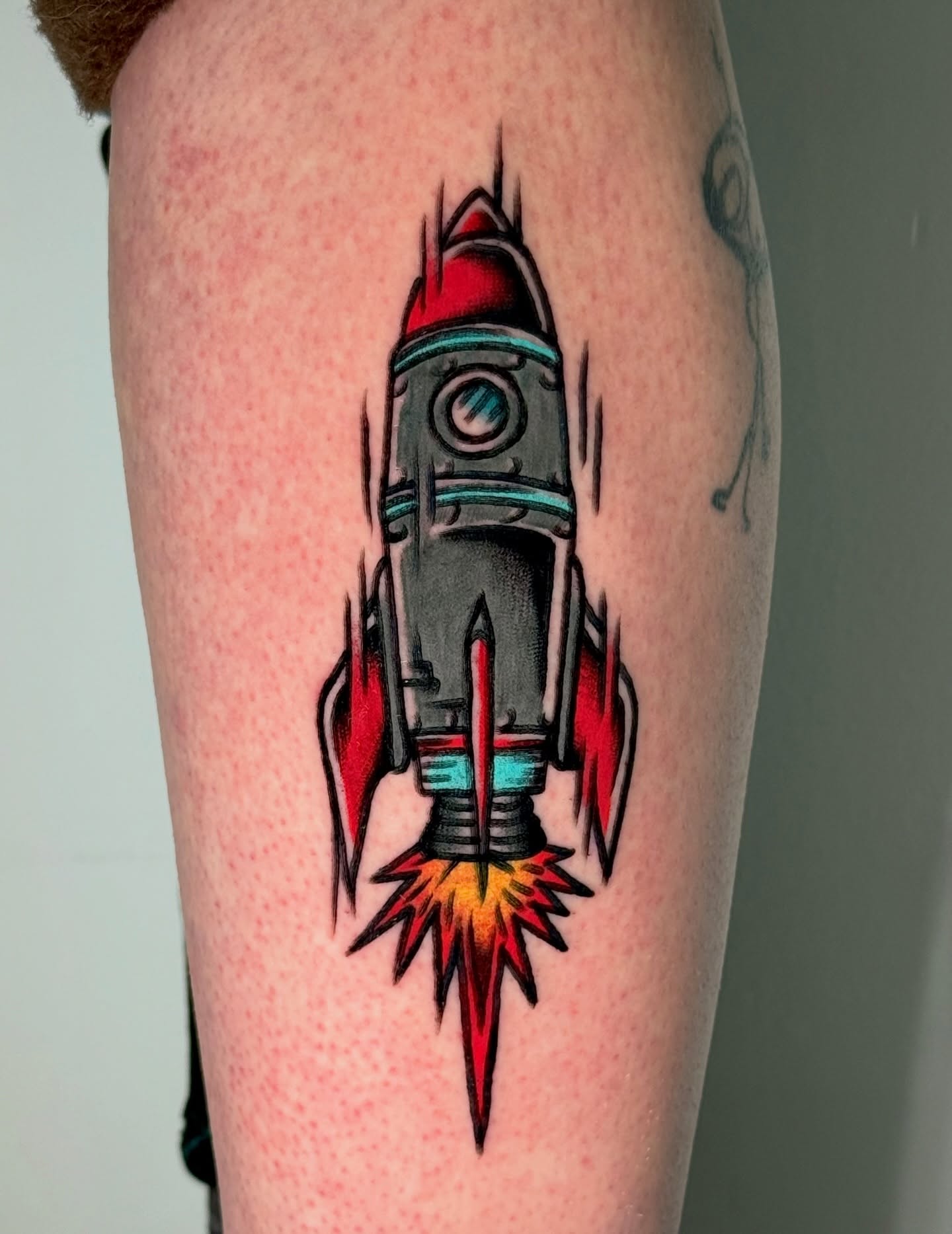 Rocket American traditional tattoo on the forearm by Tattooer Sancho 🇰🇷🇨🇦