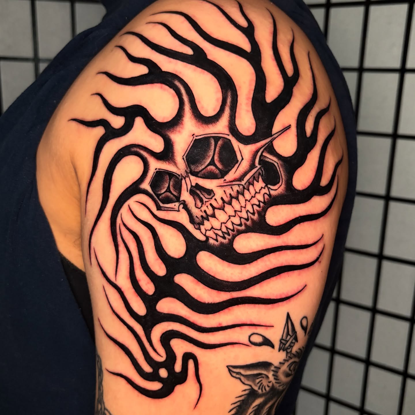 Flaming skull tribal tattoo on the shoulder by 🌴Nick Hetzel🌴, Saint Petersburg, Florida