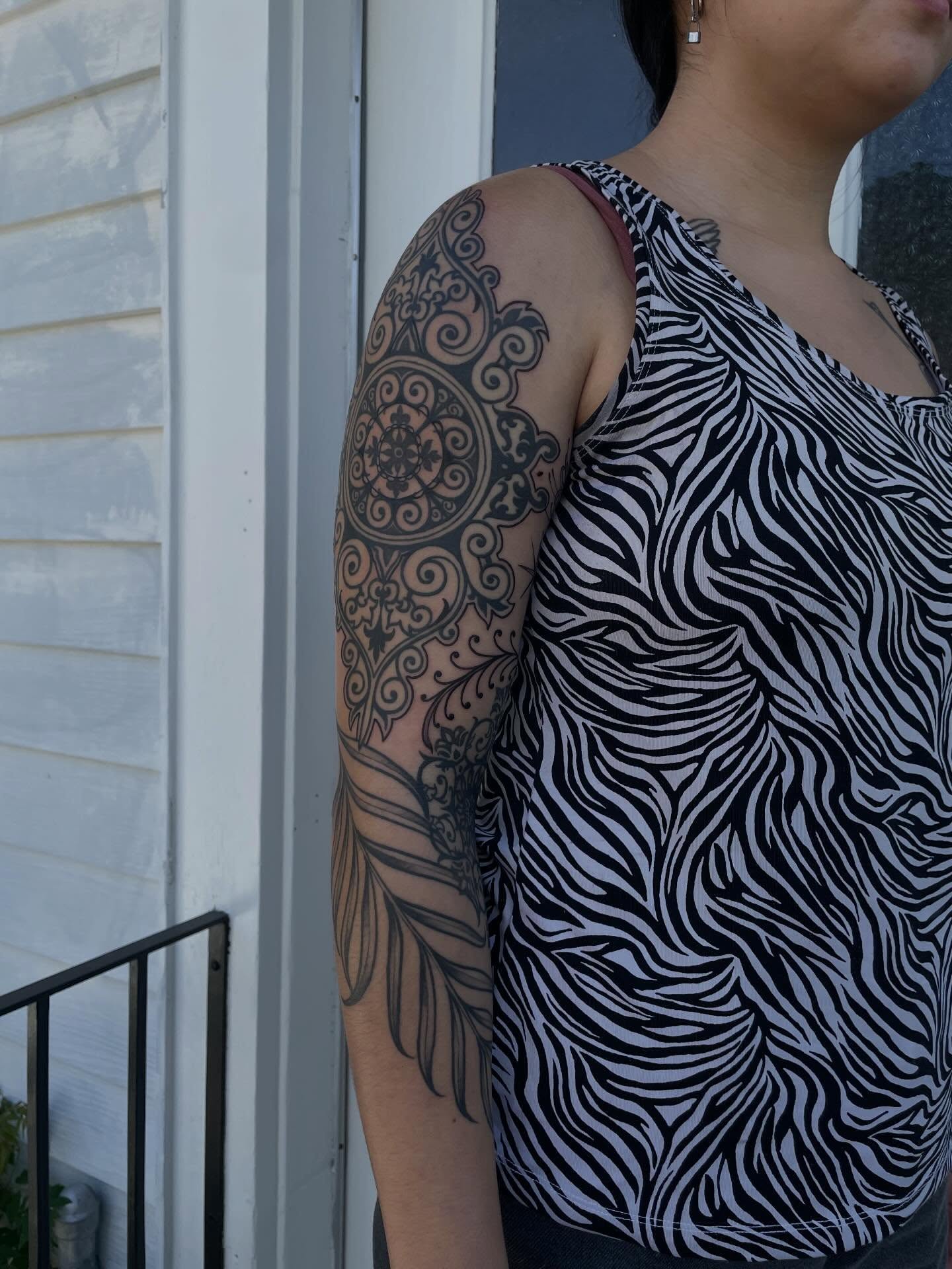Mandala ornamental tattoo on the upper arm by Danika Brooke 🧿