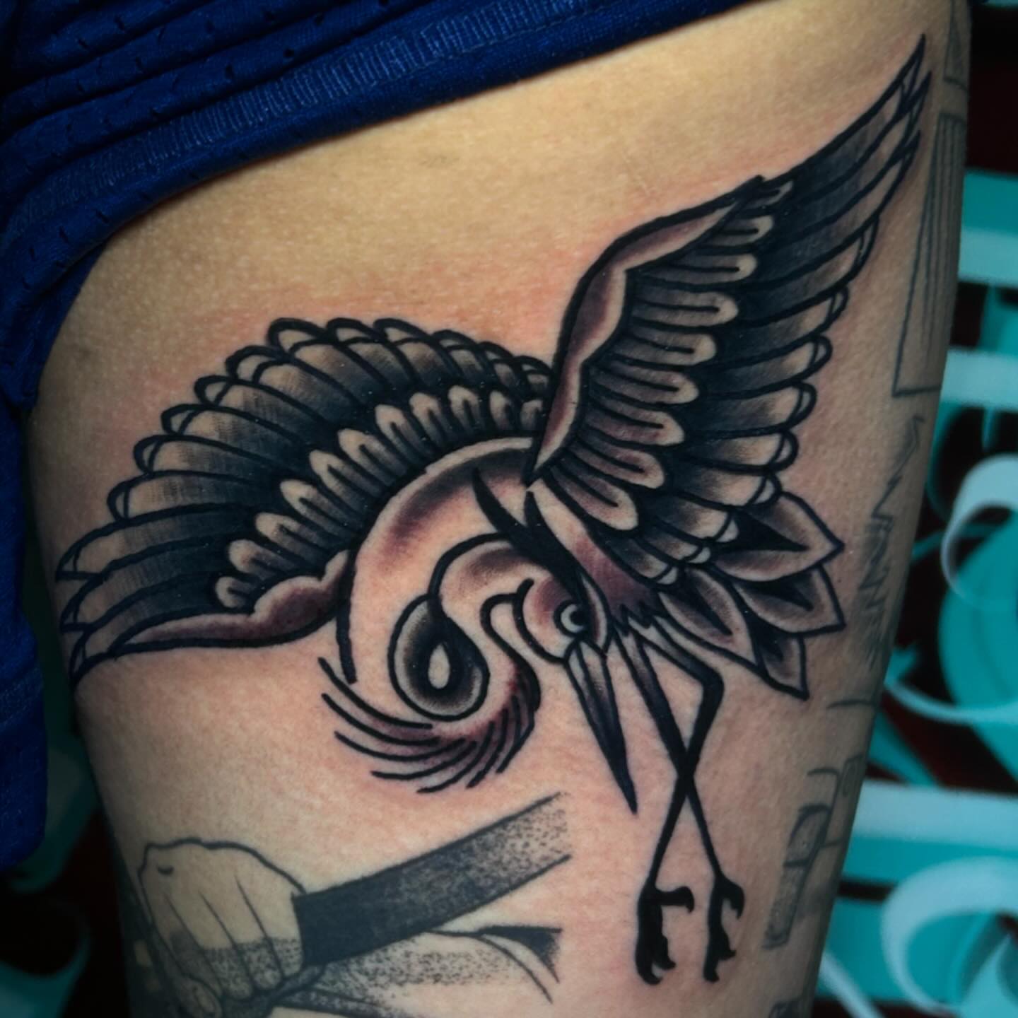 Bird American traditional tattoo on the thigh by Alycia