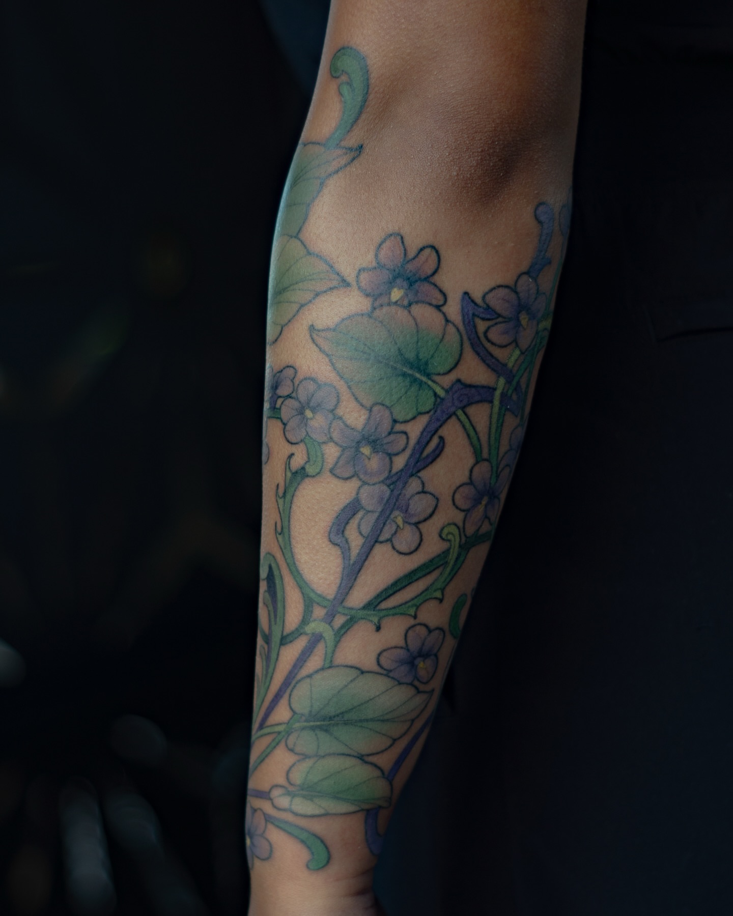 Flower vine new school tattoo on the forearm by Hannah Steele