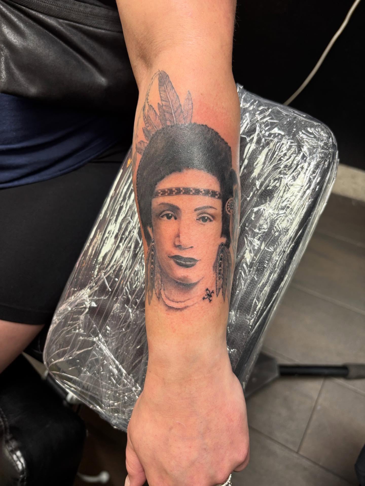 Portrait realism tattoo on the forearm by Christhian King