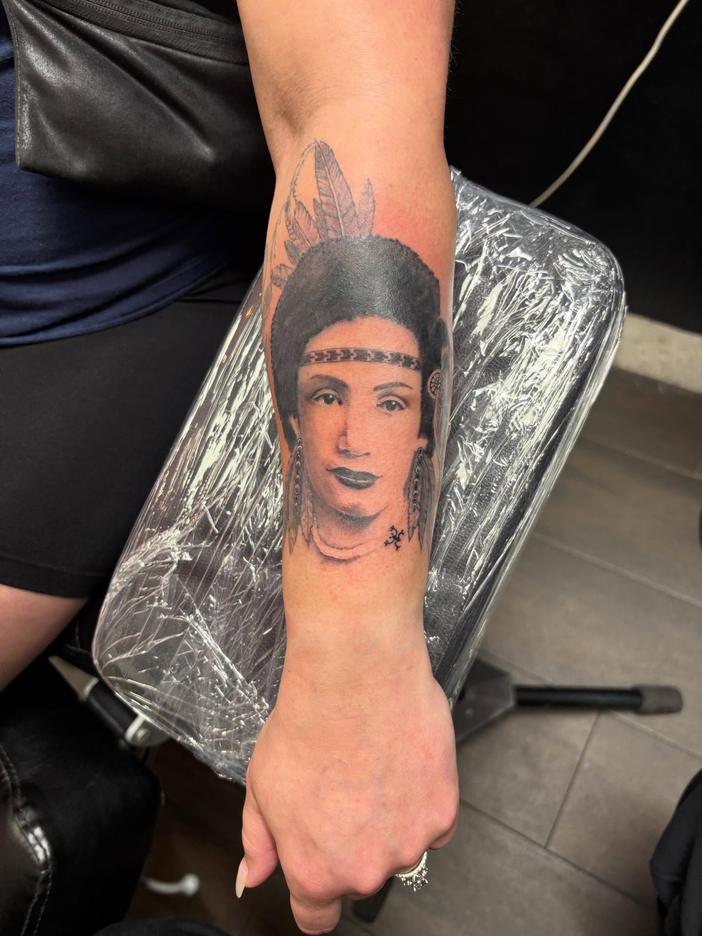 Portrait realism tattoo on the forearm by Christhian King