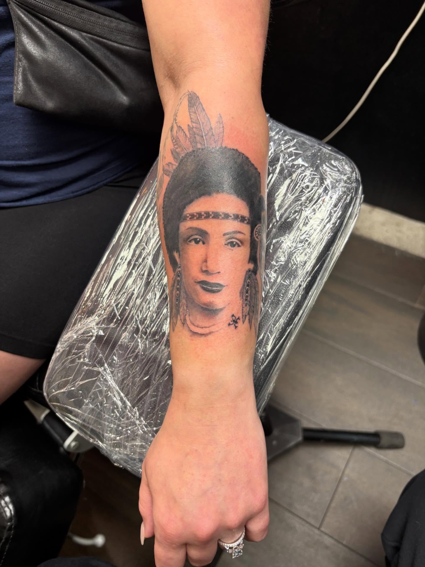 Portrait realism tattoo on the forearm by Christhian King
