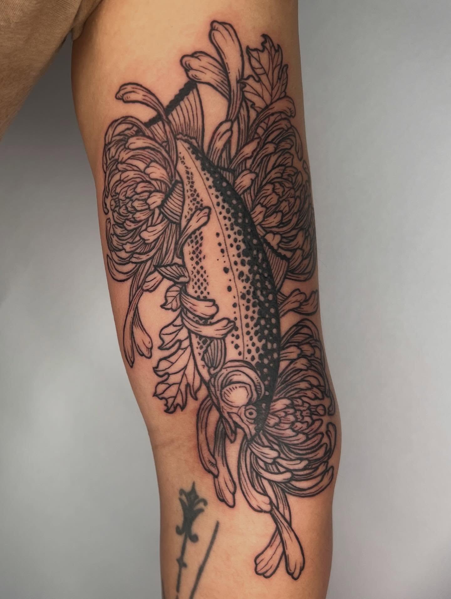 Fish and flowers dotwork tattoo on the forearm by Jason Middelton