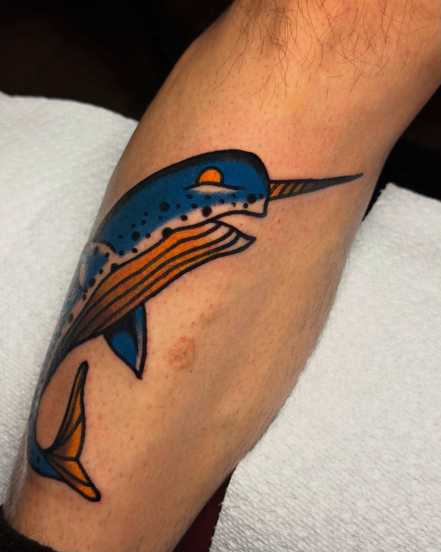 Narwhal dotwork tattoo on the forearm by Kyle Dean Traditional Tattoo Artist
