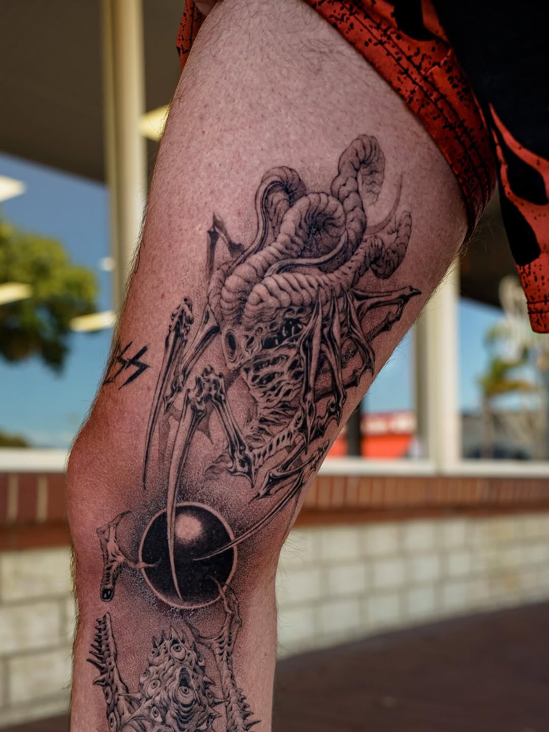 Tattoo by @nowthisyujhi — dark_realism, black_and_grey