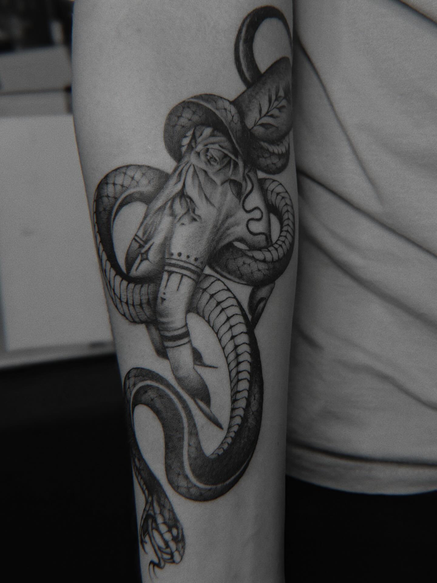 Tattoo by @brknsocialclub — black_and_grey, realism