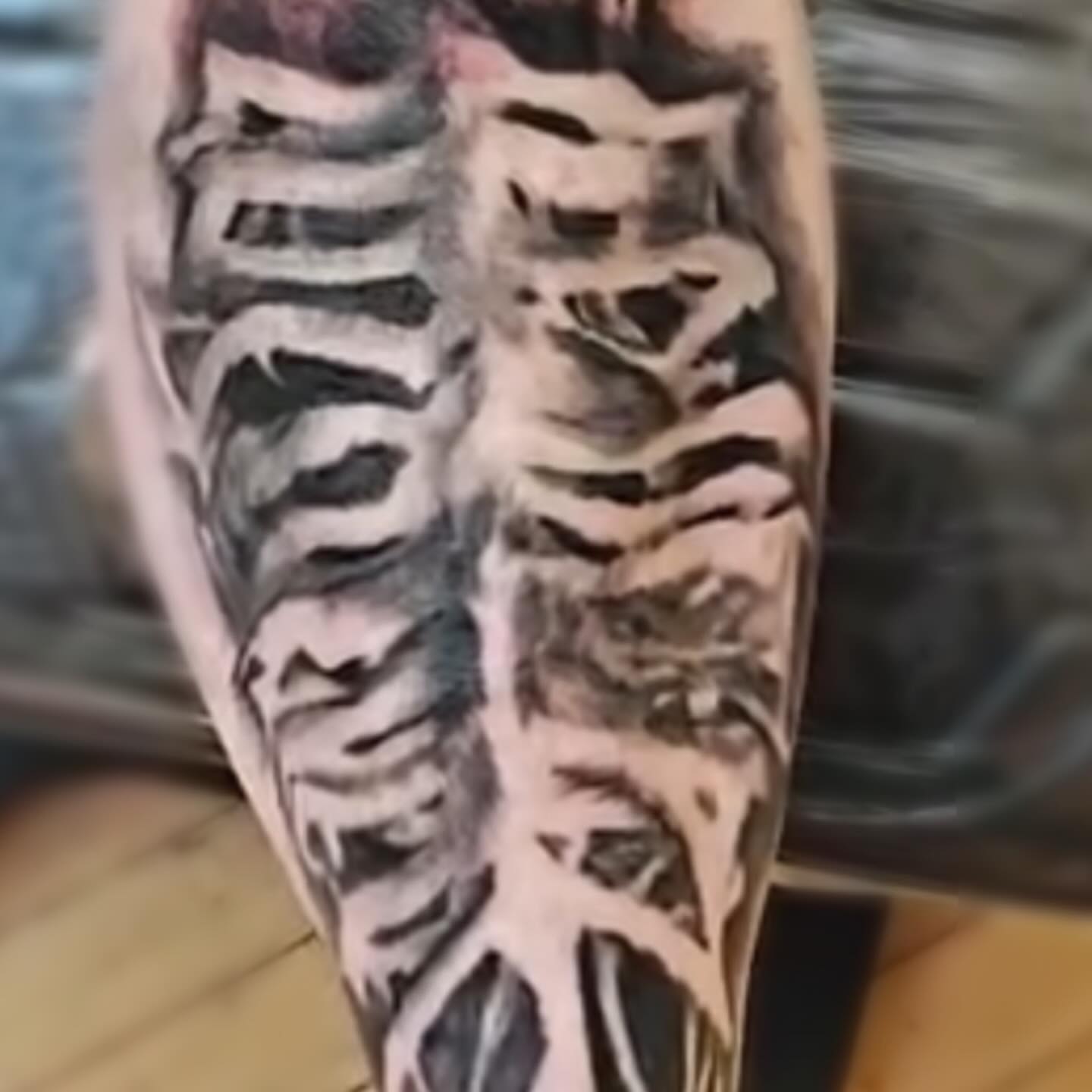Ribs black and grey tattoo on the ribs by Sebastiana