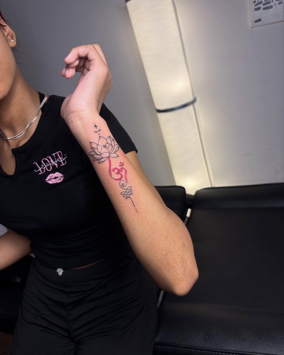 Lotus flower and om symbol lettering tattoo on the forearm by Barbie Mari ๐
โญ๏ธ