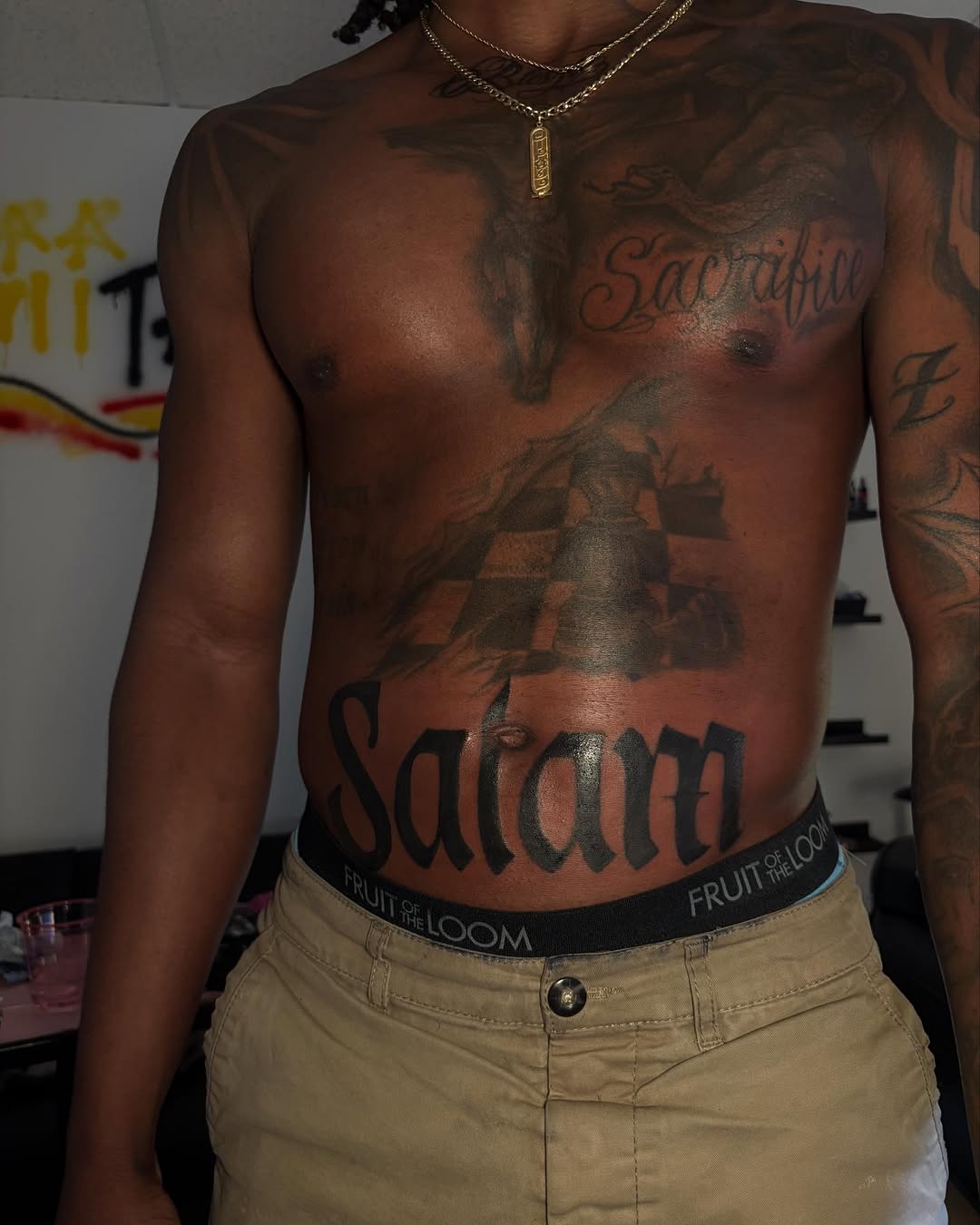 Satan lettering Chicano tattoo on the chest by Barbie Mari ๐
โญ๏ธ