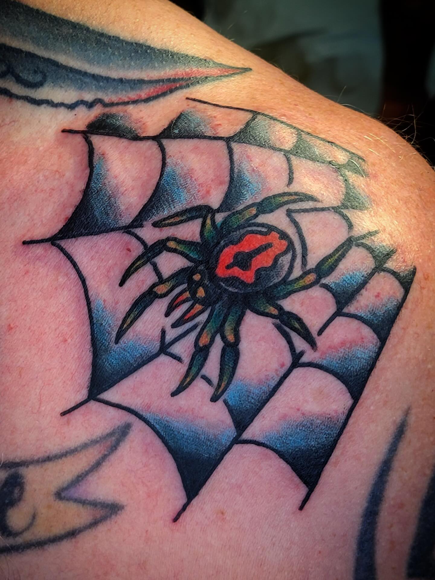 Spider American traditional tattoo on the shoulder by joe martinez, Denver, Colorado