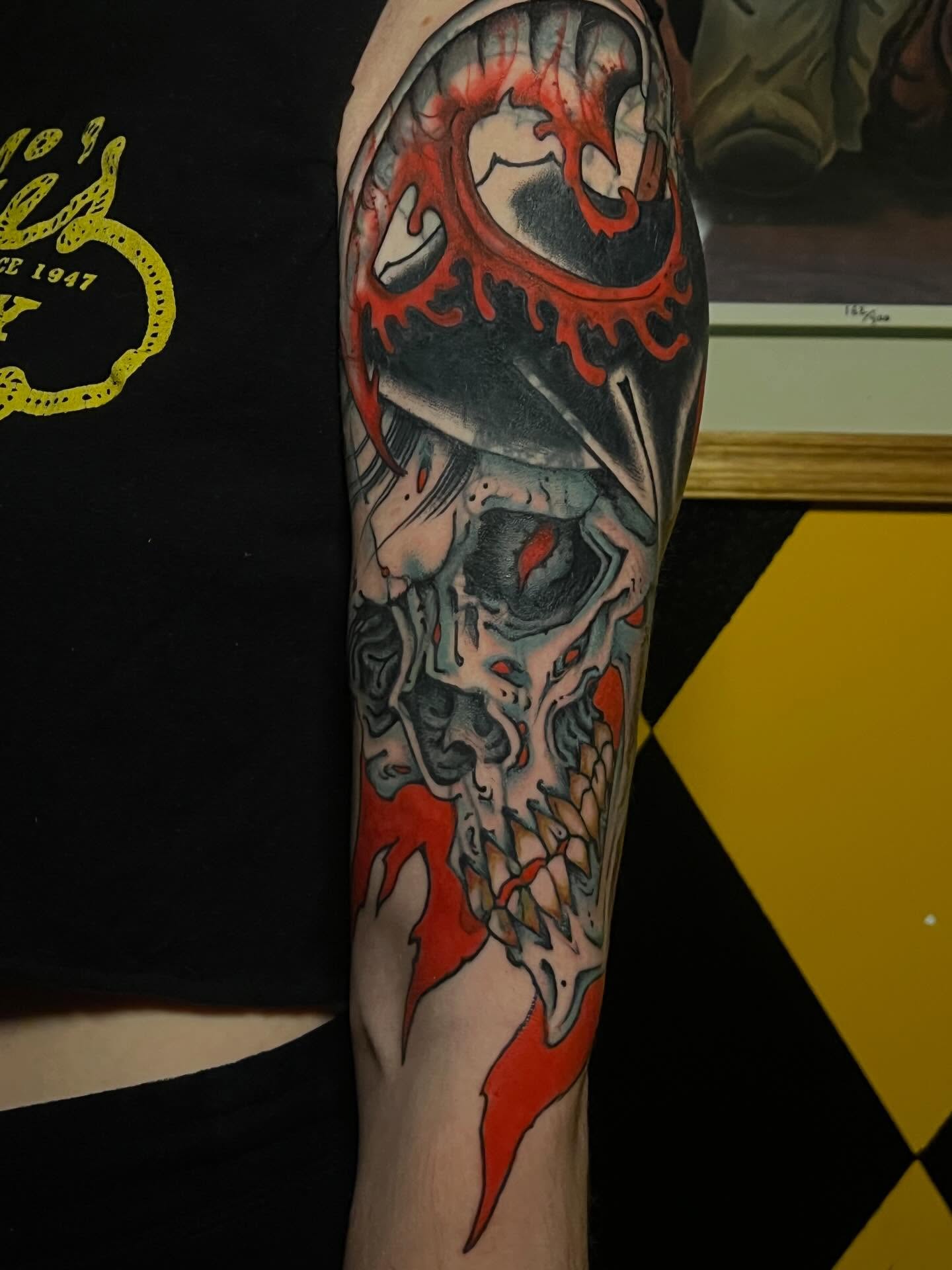Skull with flame dark realism tattoo on the forearm by Matt E.