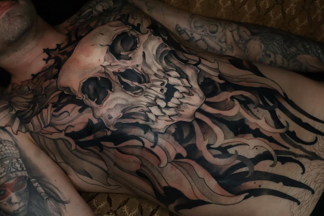 Skull with abstract elements realism tattoo on the chest by 𝒕𝒂𝒕𝒕𝒐𝒐𝒔 𝒃𝒚 𝔏𝔞𝔲𝔯𝔢𝔫 𝔐𝔬𝔫𝔣𝔬𝔯𝔱𝔢